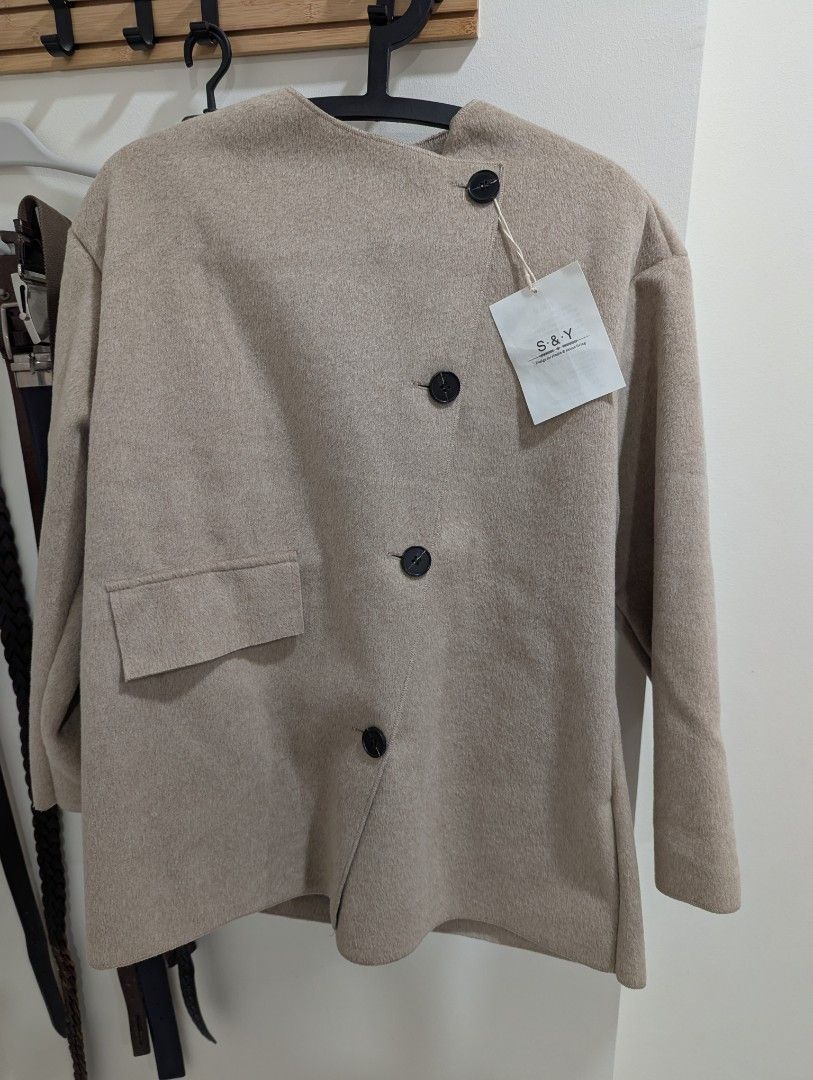 Winter Jacket (Category: Coats, Jackets and Outerwear) located in Singapore. Submitted by b_for_black (Listing ID 1420101642, Image 2). Description: Brandnew, camel color jacket.