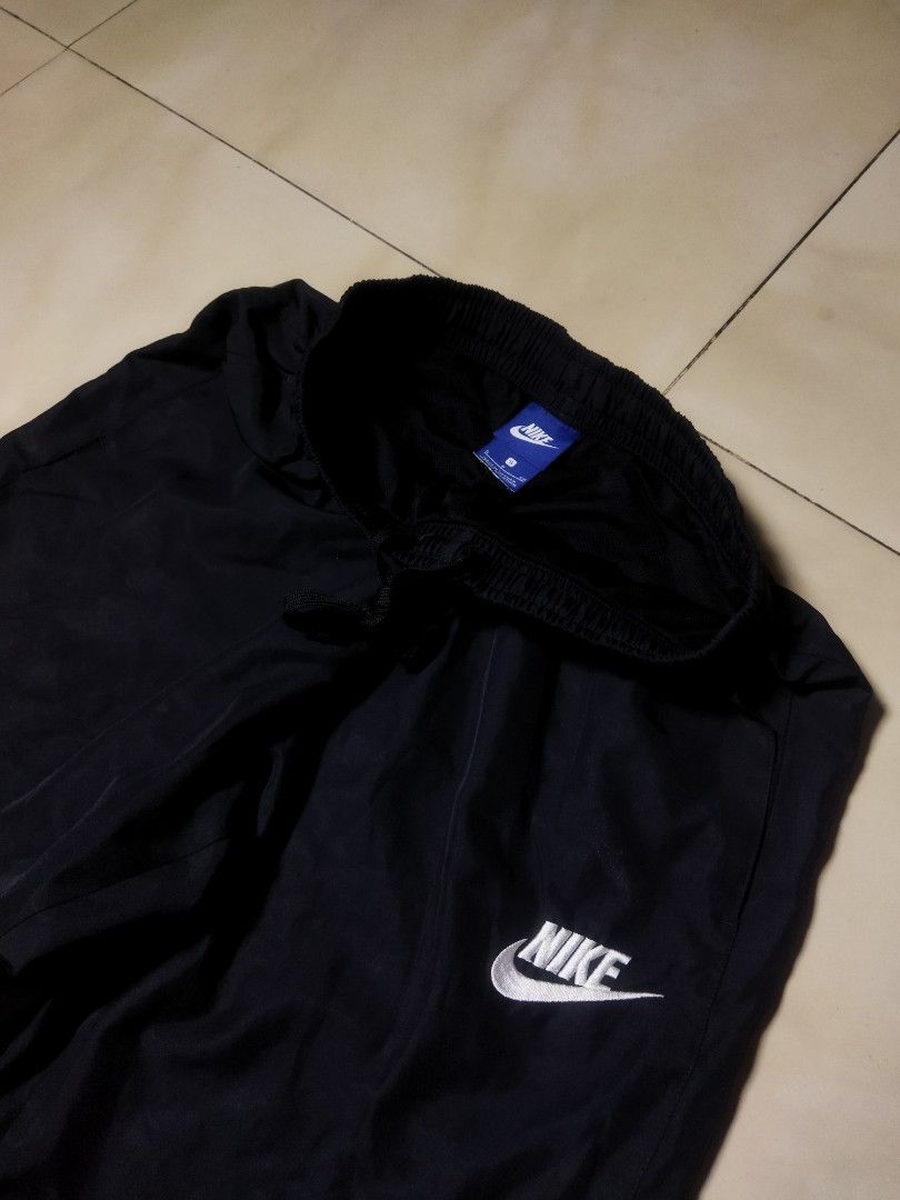 Y2K NIKE BLACK BAGGY TRACK PANTS (Category: Joggers) located in Las Pinas. Submitted by greedythrifterz (Listing ID 1420034015, Image 3). Description: Y2K NIKE BLACK BAGGY TRACK PANTS DIMES- WIDTH 28-30, LENGTH 40 THIGHS 13, LEG OPEN 8 ( ALL INCHES ) ISSUE- MINOR SCRATCH (CHECK PICS) NOT FADED FREESHIP 📩.