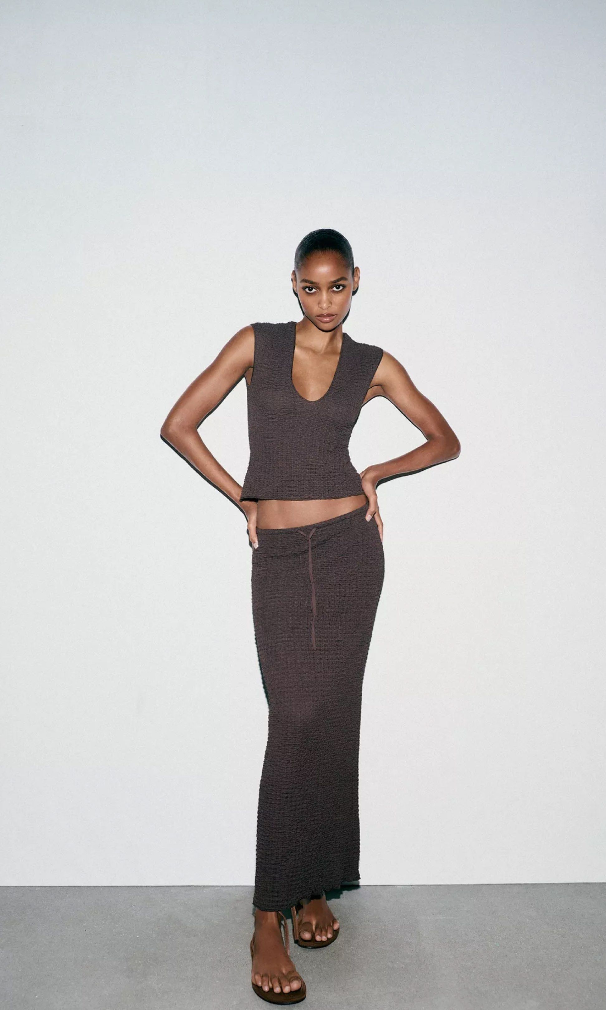 Zara Top and Skirt Coords Coordinates Set Pair (Category: Sets or Coordinates) located in Binan City. Submitted by kelly529 (Listing ID 1417226777, Image 1). Description: Last price posted. No haggling. Low ballers won’t be entertained. Brand new with tags. Sold out in stores. Chocolate color. Size small(smallest size, no xs) Textured Top Model height: 178 cm | Size: S Top made in textured fabric. V-neck and sleeveless design. CHOCOLATE | 5039/83