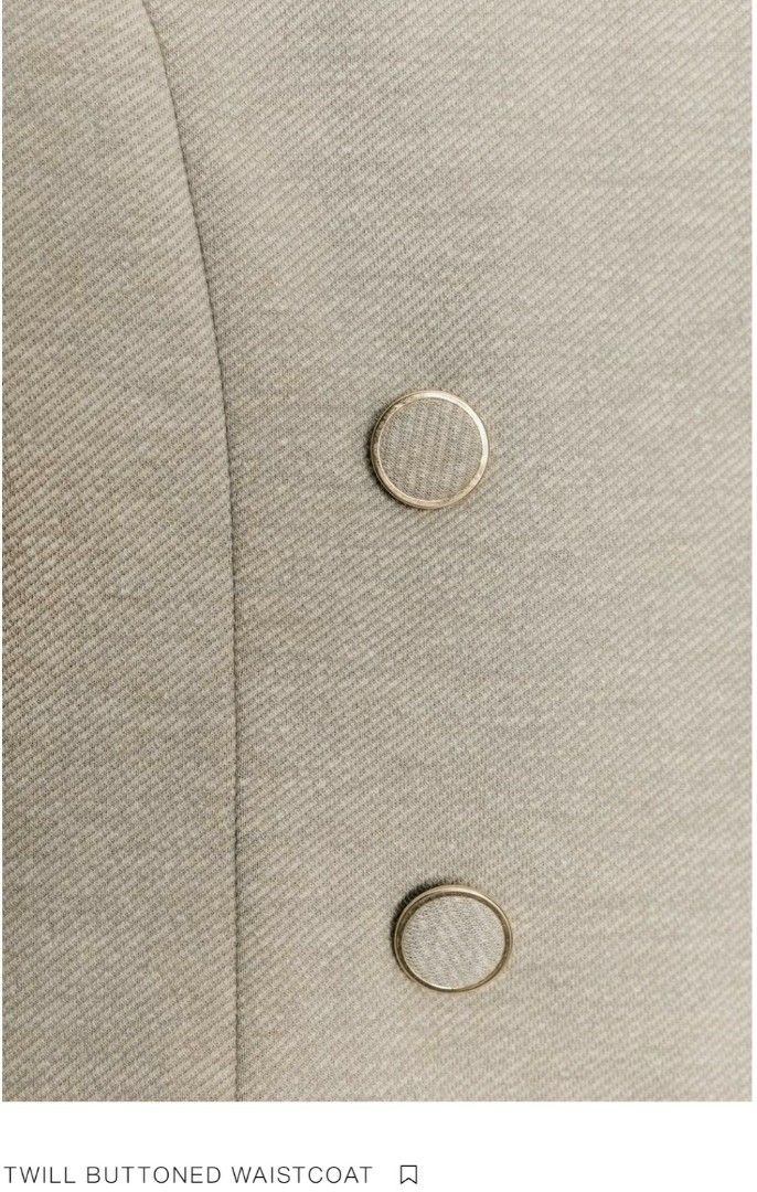 Zara Twill Buttoned Waistcoat (Category: Sleeveless) located in Tagum. Submitted by minimelstuff (Listing ID 1420093142, Image 3). Description: - Double-breasted waistcoat - Light beige color - Textured twill fabric - Tailored fit - Sleeveless - V-neck - Versatile style.