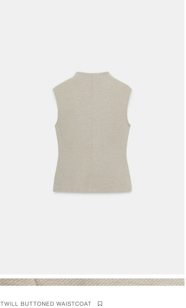 Zara Twill Buttoned Waistcoat (Category: Sleeveless) located in Tagum. Submitted by minimelstuff (Listing ID 1420093142, Image 2). Description: - Double-breasted waistcoat - Light beige color - Textured twill fabric - Tailored fit - Sleeveless - V-neck - Versatile style.