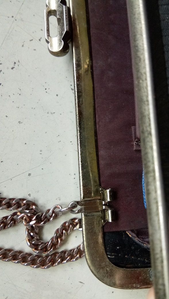 13 - Vintage Black Handbag with Chain (Category: Clutches) located in Quezon City. Submitted by rizshamelo (Listing ID 1420222329, Image 3). Description: Black Chain handle Snap closure 2 compartments separated by a zippered compartment, open inside pocket RFS: My grandmother is decluttering her collection of bags..