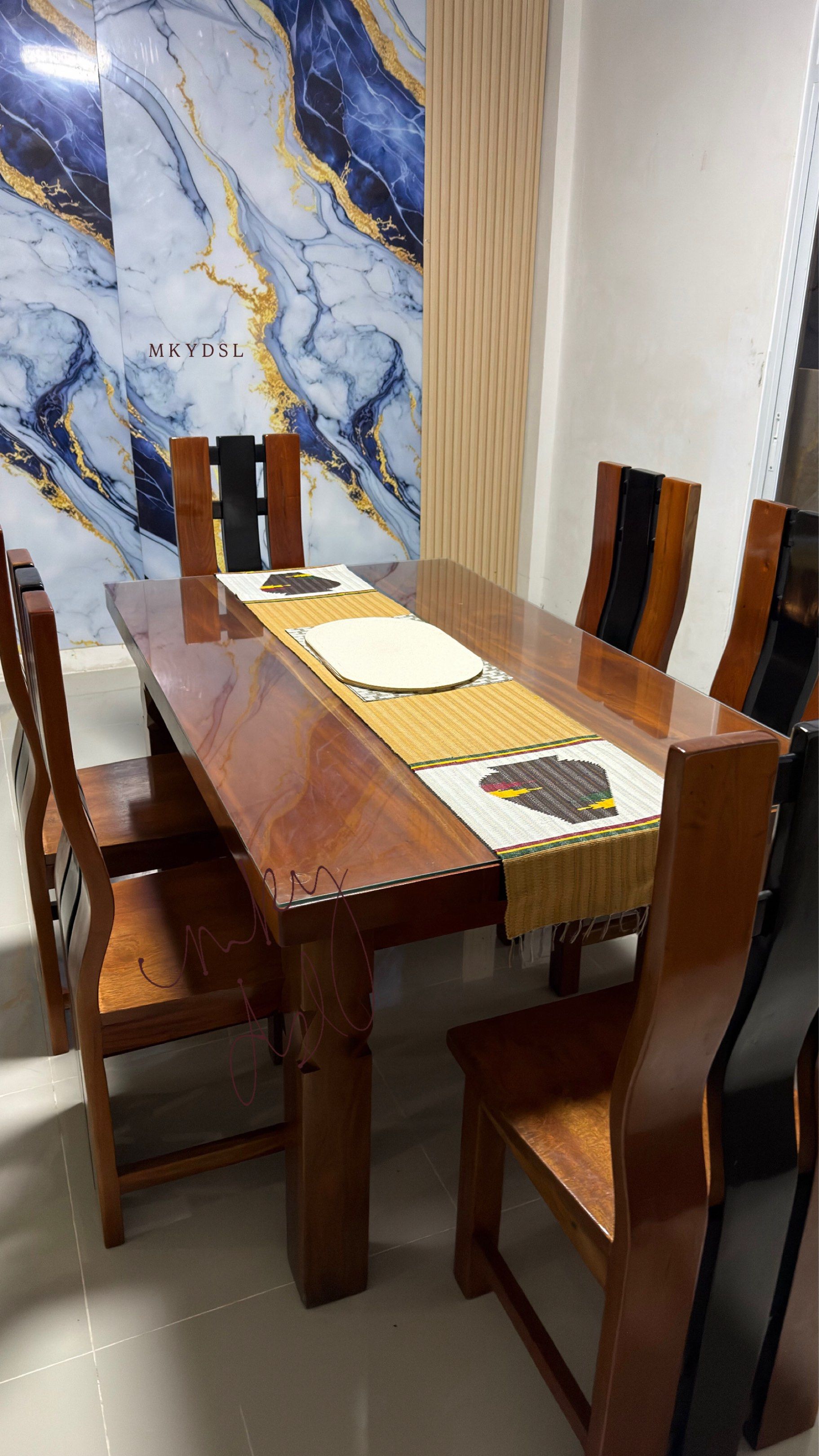 6 seater Mahogany Dining Table with top glass (Category: Tables & Sets) located in Tagaytay City. Submitted by mdcollection_ (Listing ID 1420332053, Image 1). Description: Custom made 6 seater solid mahogany wooden dining set with top glass • Made of Solid Mahogany • Wood is in pristine condition - barely used • Very heavy - Rectangular table with a glossy finish - Chairs with unique curved back design (some with black accents) - Perfect for fami