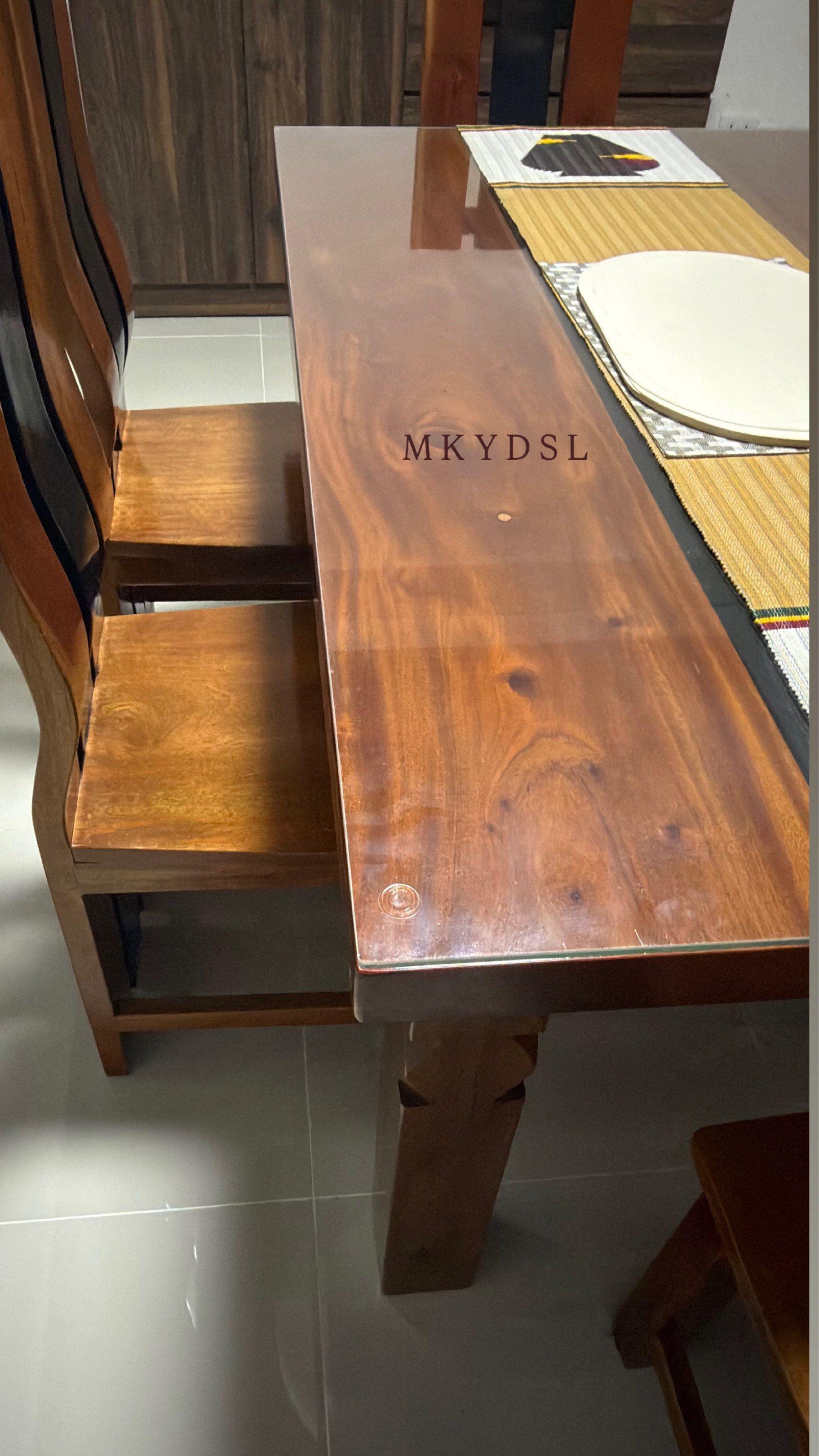 6 seater Mahogany Dining Table with top glass (Category: Tables & Sets) located in Tagaytay City. Submitted by mdcollection_ (Listing ID 1420332053, Image 3). Description: Custom made 6 seater solid mahogany wooden dining set with top glass • Made of Solid Mahogany • Wood is in pristine condition - barely used • Very heavy - Rectangular table with a glossy finish - Chairs with unique curved back design (some with black accents) - Perfect for fami