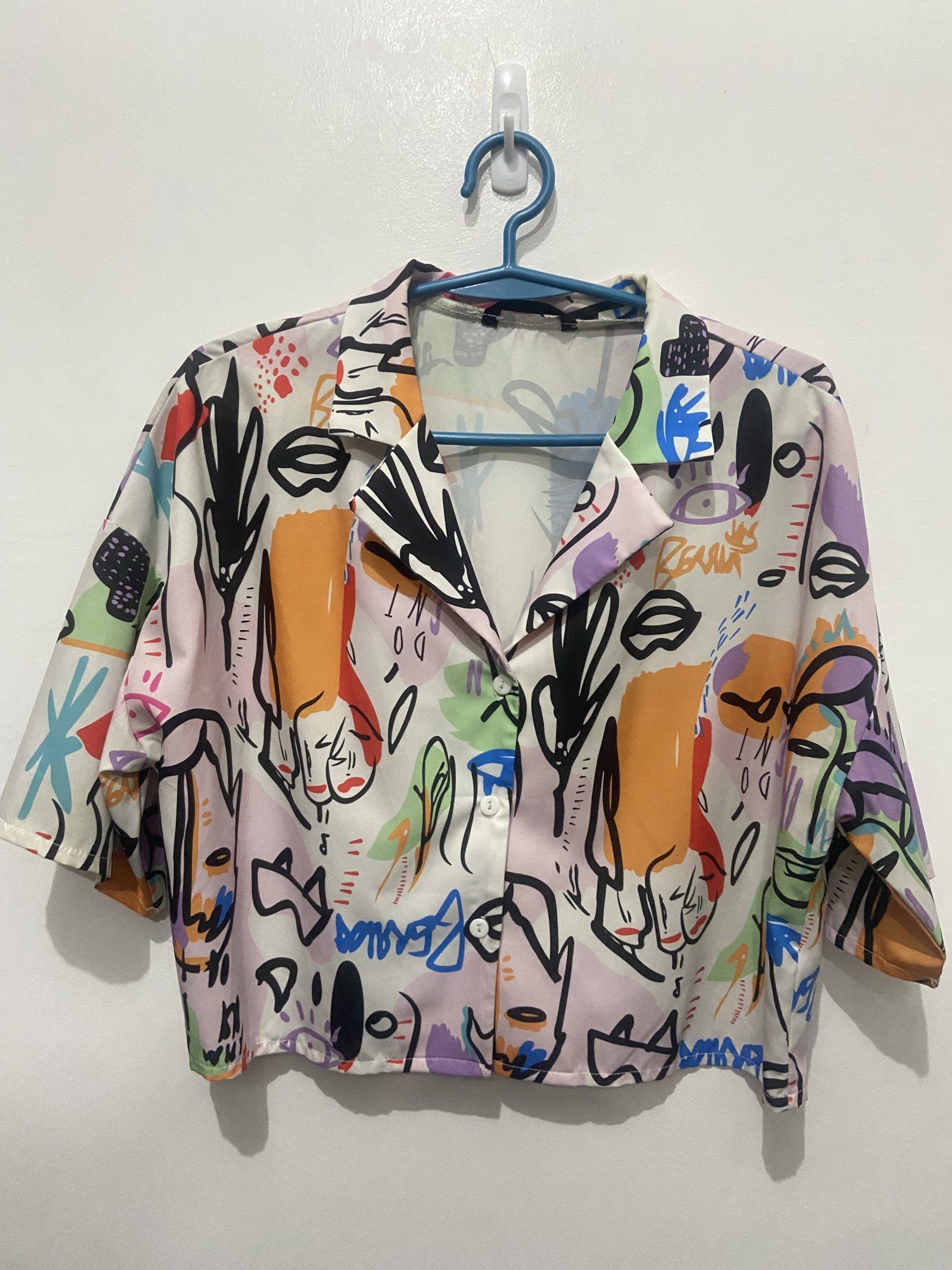 Abstract Print Cropped Blouse (Category: Blouses) located in Pasay City. Submitted by trixietrix (Listing ID 1420271937, Image 1). Description: M-L frame up to 38” bust.
