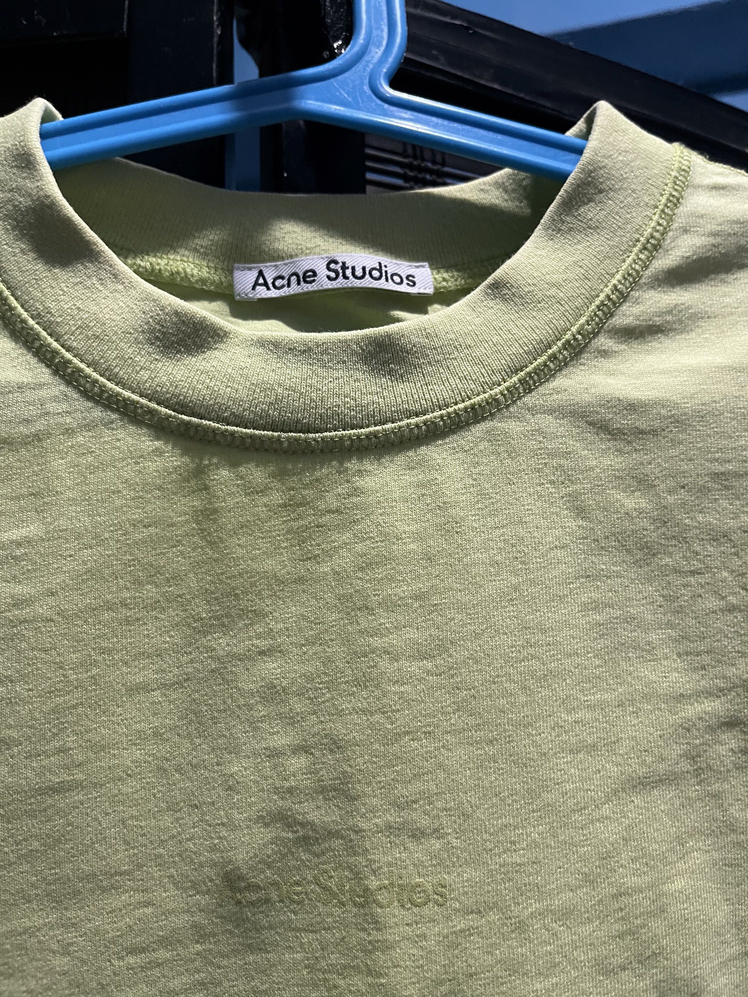 Acne Studios Green T-shirt (Category: Tshirts & Polo Shirts ) located in Manila. Submitted by zionpreloved (Listing ID 1420297318, Image 2). Description: - Acne Studios T-shirt - Vibrant green color - Features the Acne Studios logo - Size: XXS - Material: 100% cotton - Style: Crew neck, short sleeves - Made in Portugal.