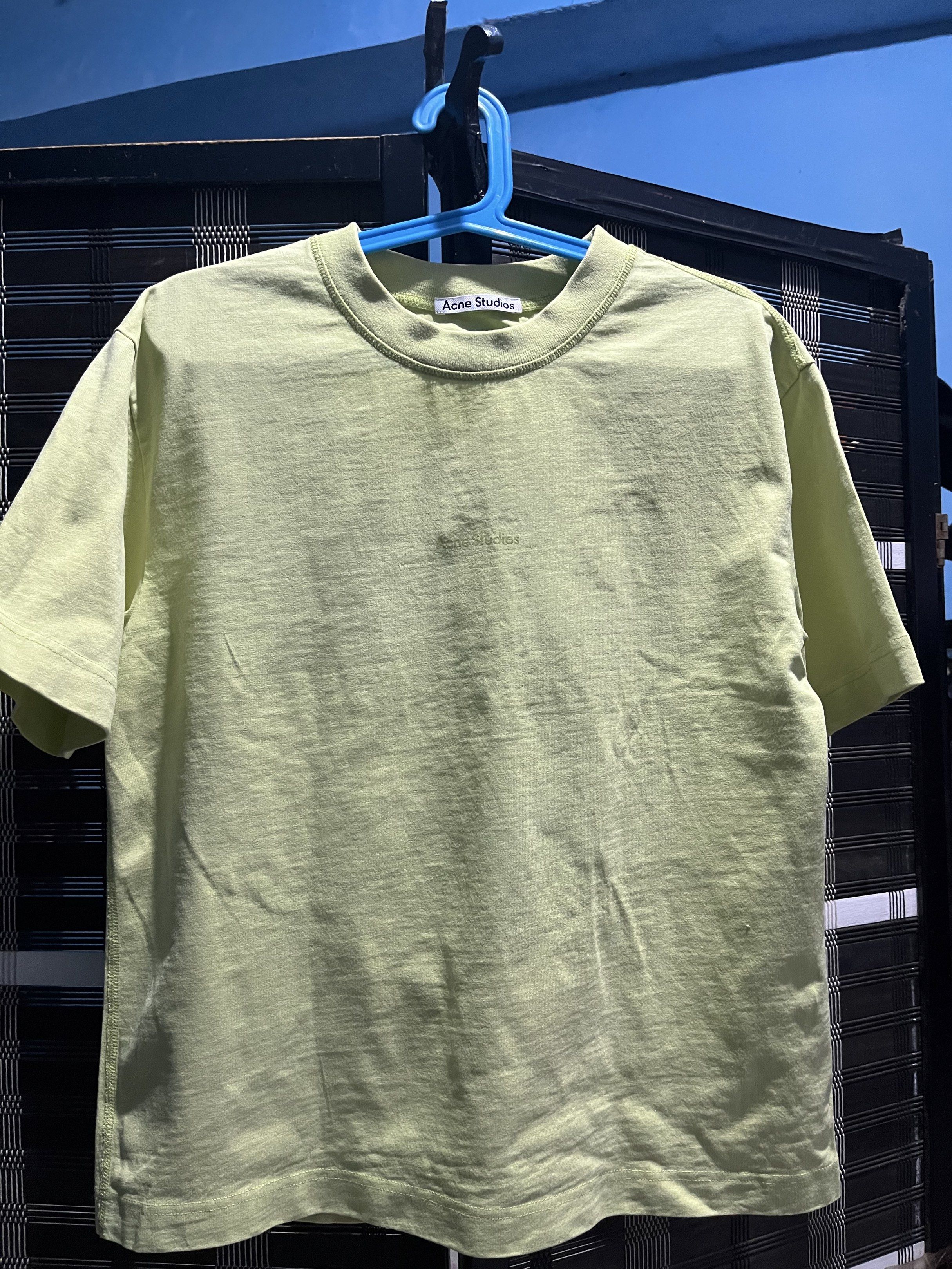 Acne Studios Green T-shirt (Category: Tshirts & Polo Shirts ) located in Manila. Submitted by zionpreloved (Listing ID 1420297318, Image 1). Description: - Acne Studios T-shirt - Vibrant green color - Features the Acne Studios logo - Size: XXS - Material: 100% cotton - Style: Crew neck, short sleeves - Made in Portugal.