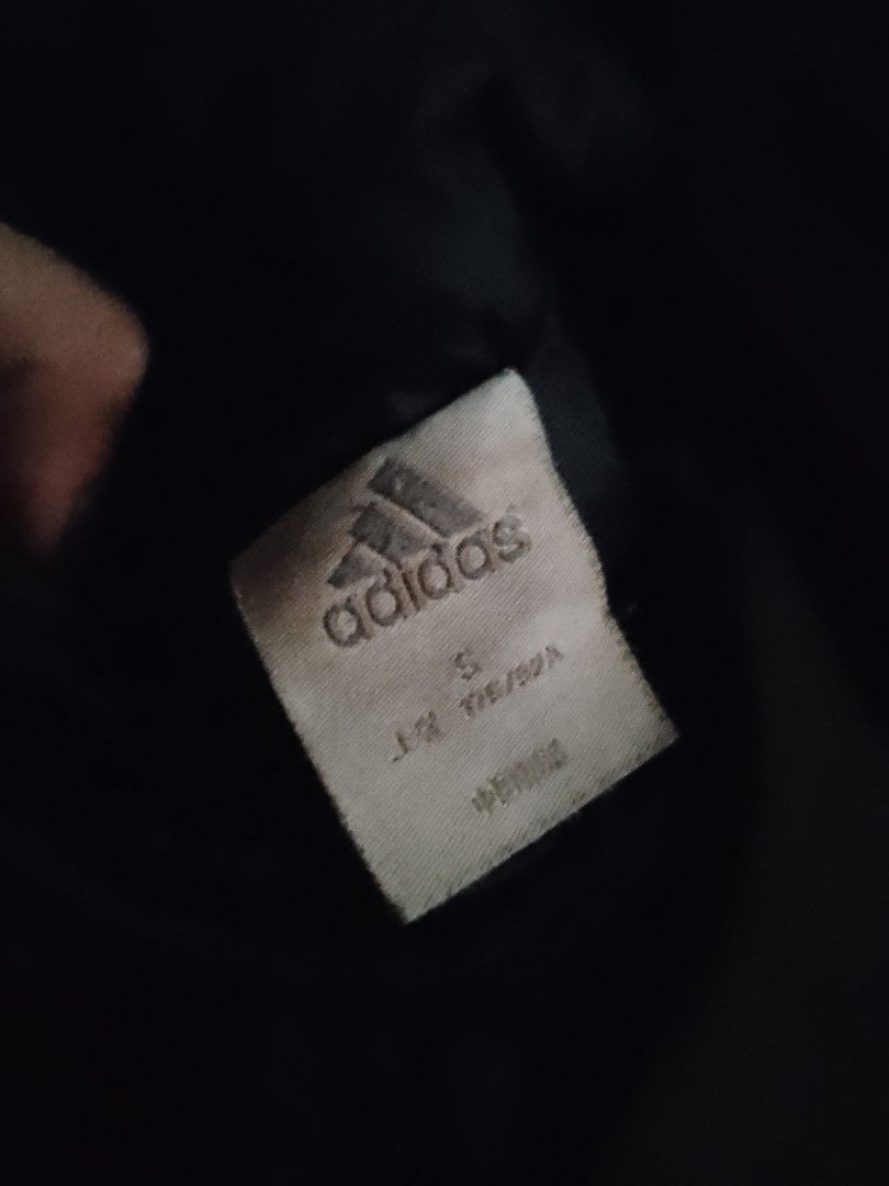 Adidas Padded Jacket with Blue Stripes (Category: Coats, Jackets and Outerwear) located in Manila. Submitted by thrift2something (Listing ID 1420345393, Image 3). Description: - Black Adidas padded jacket - Blue stripes on sleeves - High collar - Full-length zipper - Adidas logo on chest - Quilted design - Two side pockets - Classic and stylish.