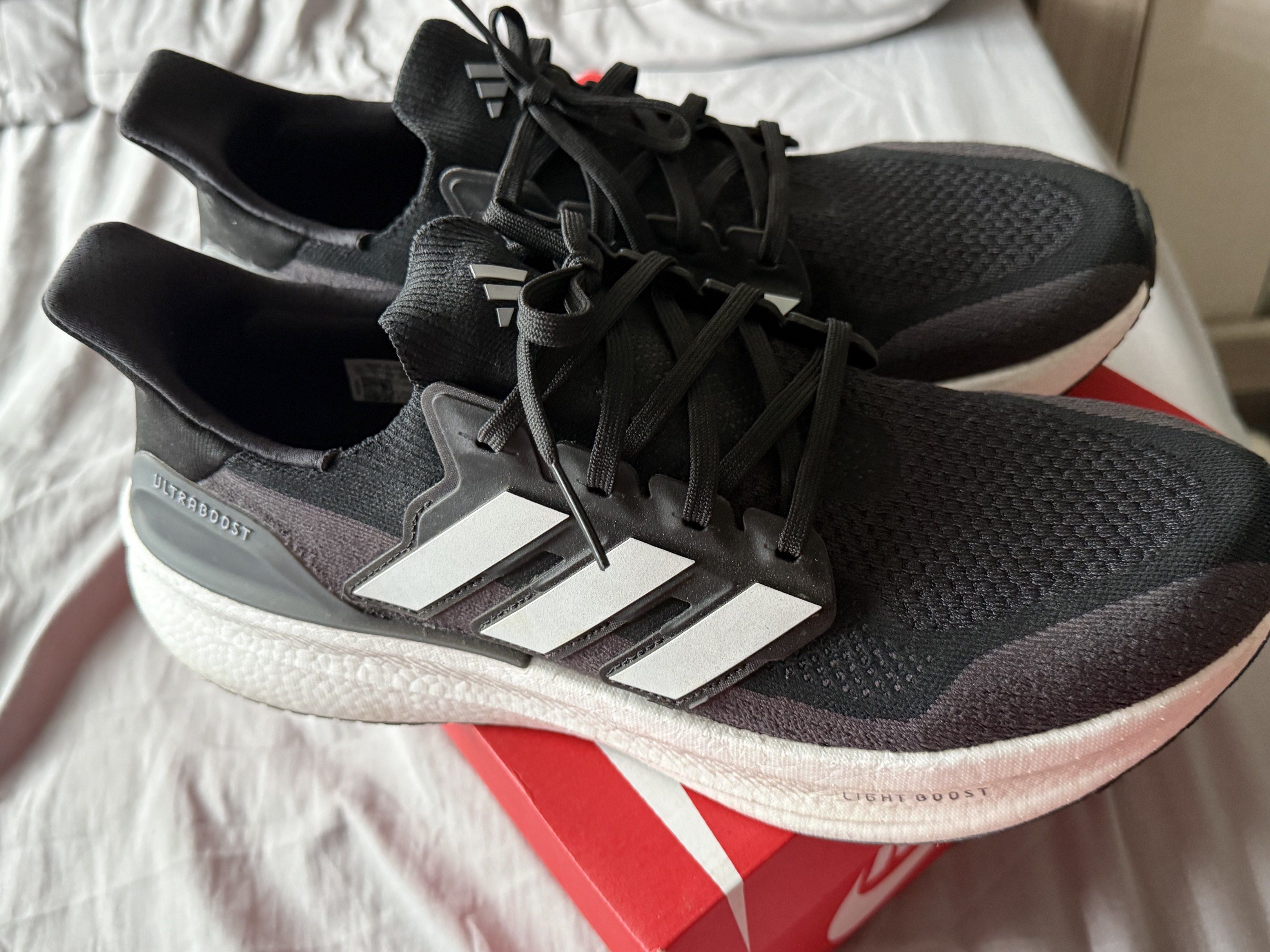 Adidas Ultraboost 22 Black White (Category: Sneakers) located in Pasig City. Submitted by louisyana (Listing ID 1420191408, Image 1). Description: - Adidas Ultraboost - Black and white colorway -used thrice - US size 11.5, UK size 11, EUR size 46 - alternate box only Mandaluyong area.
