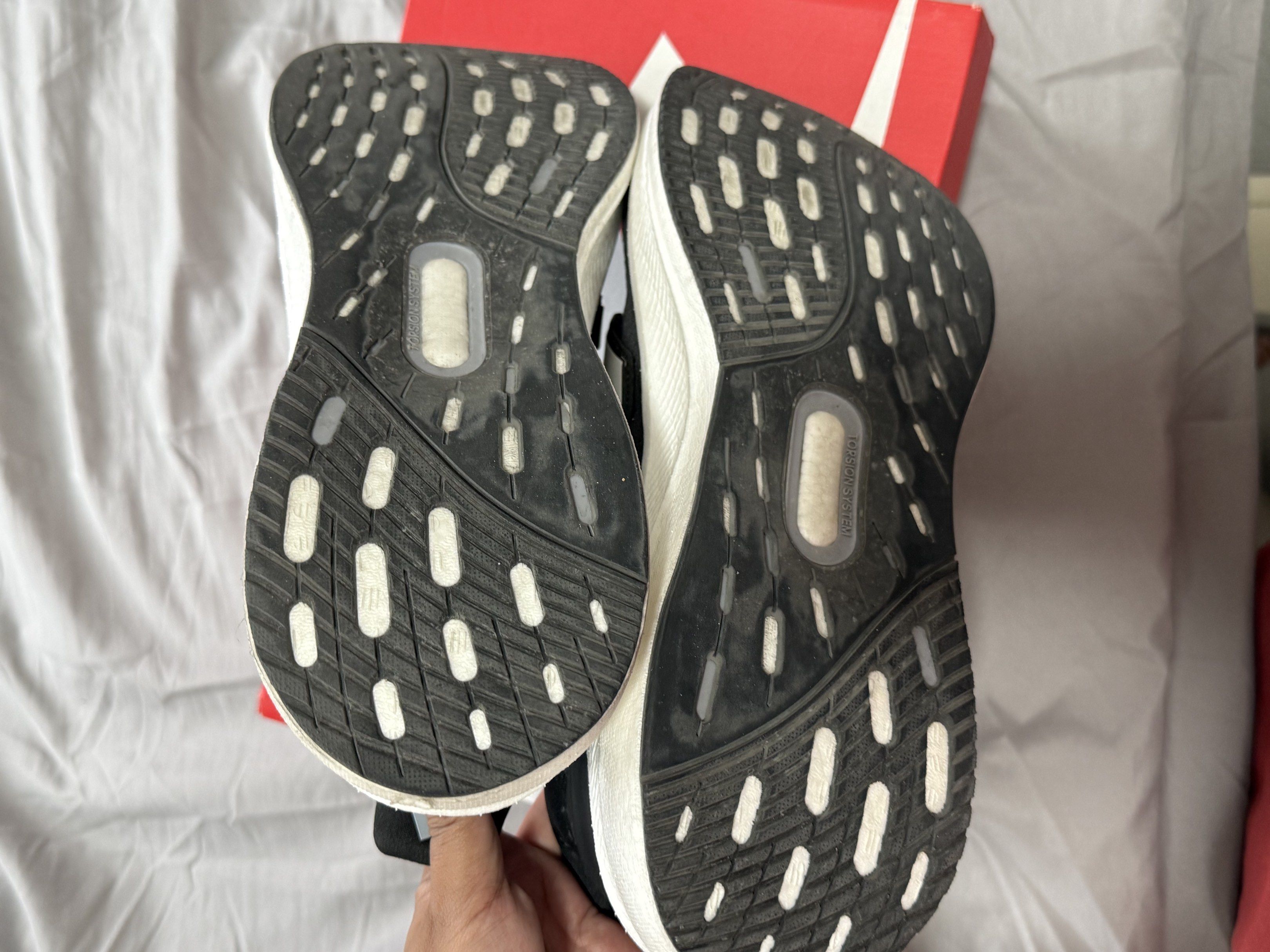 Adidas Ultraboost 22 Black White (Category: Sneakers) located in Pasig City. Submitted by louisyana (Listing ID 1420191408, Image 3). Description: - Adidas Ultraboost - Black and white colorway -used thrice - US size 11.5, UK size 11, EUR size 46 - alternate box only Mandaluyong area.