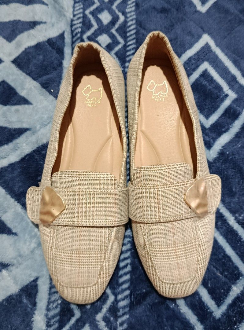 Agatha Paris Plaid Flats - Size 240 (Category: Flats & Sandals) located in Bangued. Submitted by lenc79928 (Listing ID 1420225010, Image 2). Description: - Agatha Paris flats - Plaid pattern - Size 240 - Decorative strap with gold accent - Neutral color - Versatile for different outfits - Features Agatha Paris logo on insole.