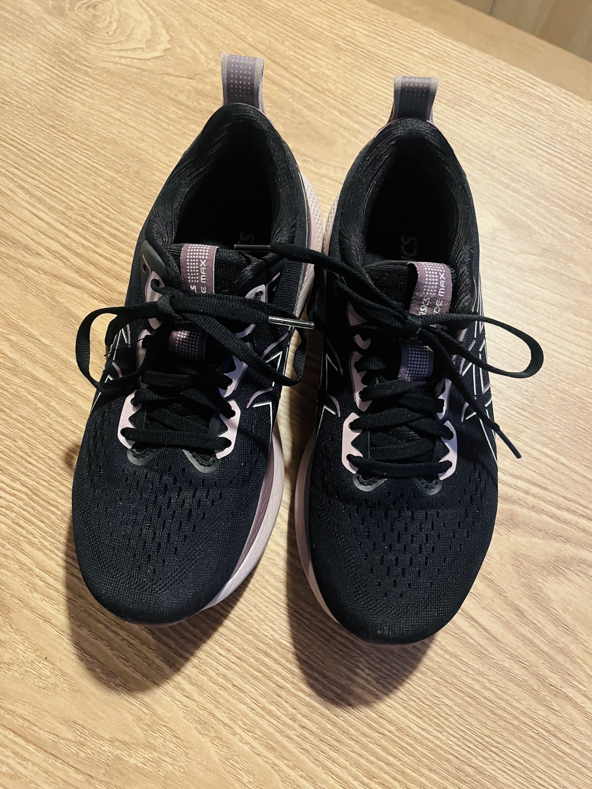 Asics GlideRide Max Running Shoes US8 (Category: Sneakers) located in Calamba. Submitted by nemstudio (Listing ID 1420282205, Image 3). Description: - Asics GlideRide Max running shoes - Color: Black and Pink - Size: US 8, EUR 39.5 - Features: Breathable mesh upper, cushioned sole - Closure: Lace-up - Made in Vietnam - Bought in Japan for 8k - Slightly used, less than 50km - No damage or repair - Walang pudpod na part, looks NEW.
