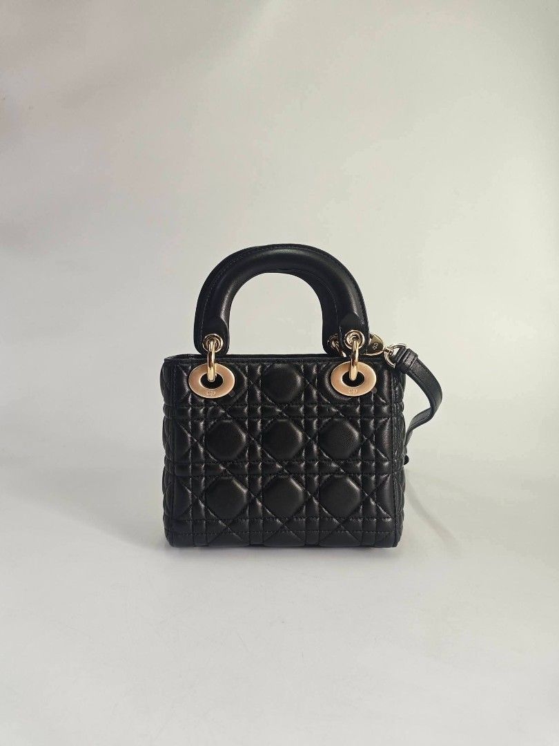 Authentic Christian Dior Lady Dior Black Mini Bag (Category: Tote Bags) located in Quezon City. Submitted by hollowwillow (Listing ID 1420199746, Image 3). Description: - Authentic Lady Dior mini bag - Color: Black - Iconic Cannage stitching - Gold-tone hardware - Detachable shoulder strap - Top handle - Includes dust bag, box ⚠️ STRICTLY PAYMENT FIRST ⚠️ NO MEET UP, NO PICK UP ⚠️ If in doubt, please buy somewhere else For same day delivery via l