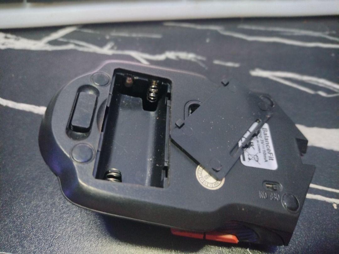 BalanceFit 2.4GHz Wireless 4D Gaming Mouse (Category: Mouse & Mousepads) located in Caloocan City. Submitted by deokledus (Listing ID 1420214523, Image 2). Description: BalanceFit wireless gaming mouse features a red and black design. It has a DPI button and a scroll wheel. The mouse requires two AA batteries (included). The USB receiver is stored in the mouse. It has an on/off switch. The mouse is marked as CE UK CA. and 2 side buttons. Using so