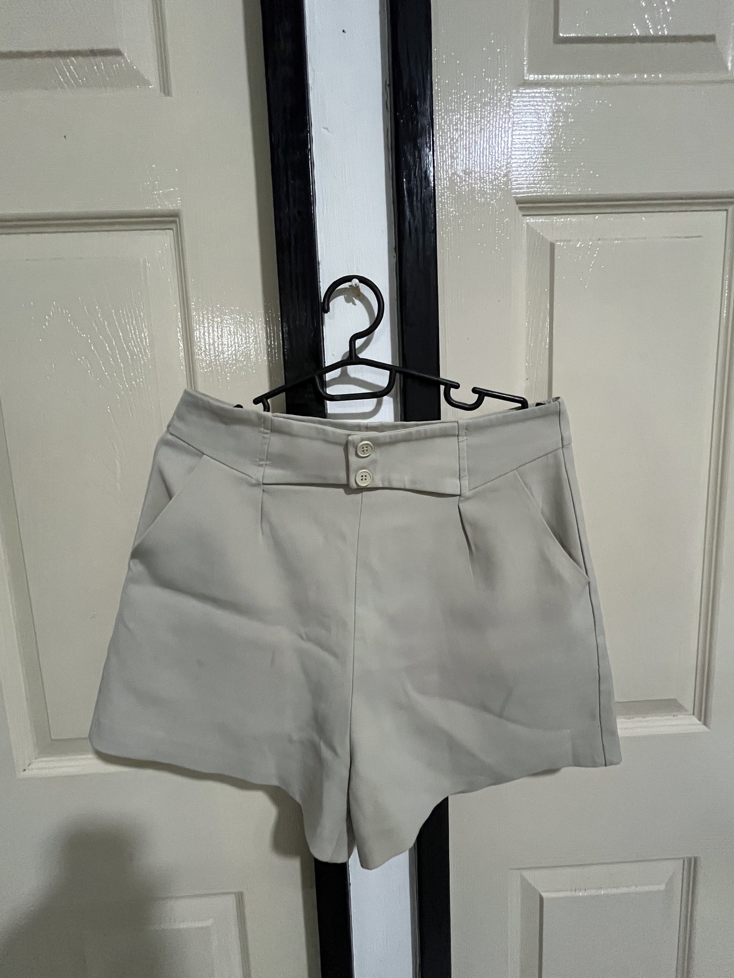 Beige Shorts (Category: Shorts) located in Bacolod City. Submitted by closettingbcd (Listing ID 1420281673, Image 1). Description: Selling my lightly used shorts No damage Zipper found at the back Fits medium - large .