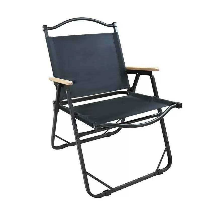 Black Folding Camping Chair (Category: Chairs) located in Manila. Submitted by lyfrancois14 (Listing ID 1420302231, Image 2). Description: Black folding chair is perfect for outdoor activities. It features a sturdy metal frame with wooden armrests. The chair measures 78cm in height, 52.5cm in width, and 52cm in depth. The seat height is 40cm. It's easy to fold and carry, making it ideal for camping, picnics, or any outdoor event..
