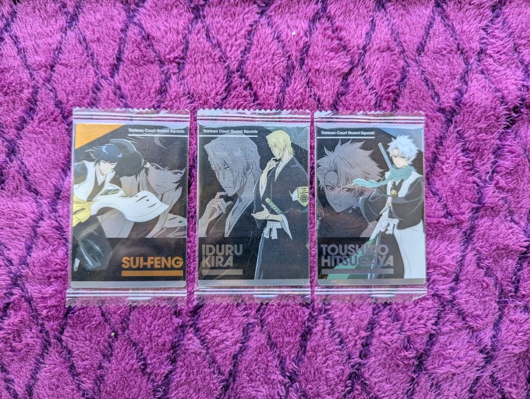 Bleach Anime Wafer Cards Set (3pcs) (Category: Raw Singles) located in Tandag. Submitted by mooncrate (Listing ID 1420245321, Image 1). Description: - Set of 3 Bleach trading cards. - Features Sui-Feng, Iduru Kira, and Toushiro Hitsugaya. - Each card is sealed. - Original packaging. - Perfect for Bleach fans and collectors..