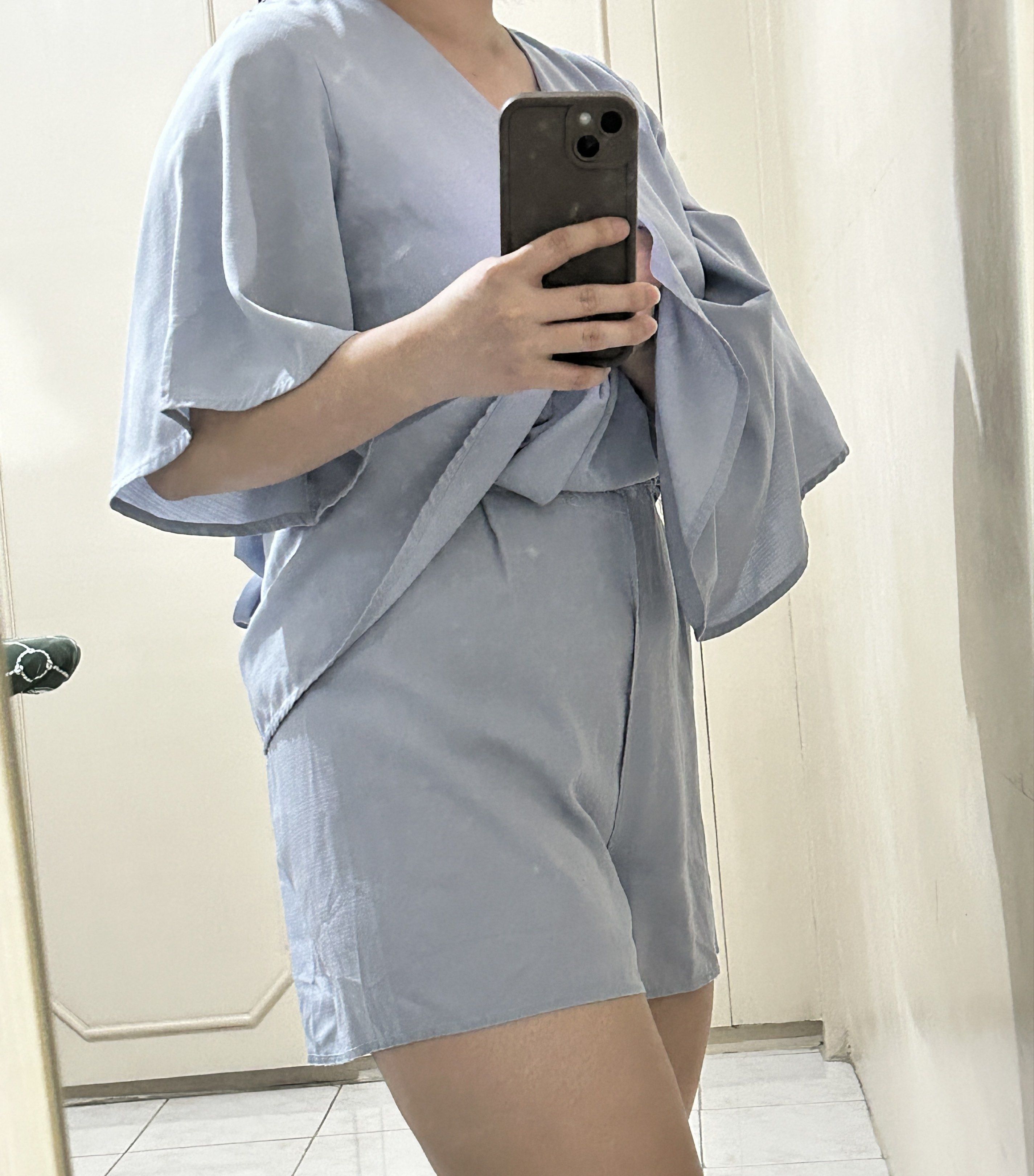 Blue Cute Dress with inner shorts (Category: Dresses) located in Bacoor. Submitted by kyespreloved (Listing ID 1420305857, Image 3). Description: Super cute dress!!! - Light blue wrap dress with Flutter sleeves - V-neckline - Tie-back detail with zipper (for the snatched waist!) - Lightweight fabric - Suitable for casual or semi-formal wear.