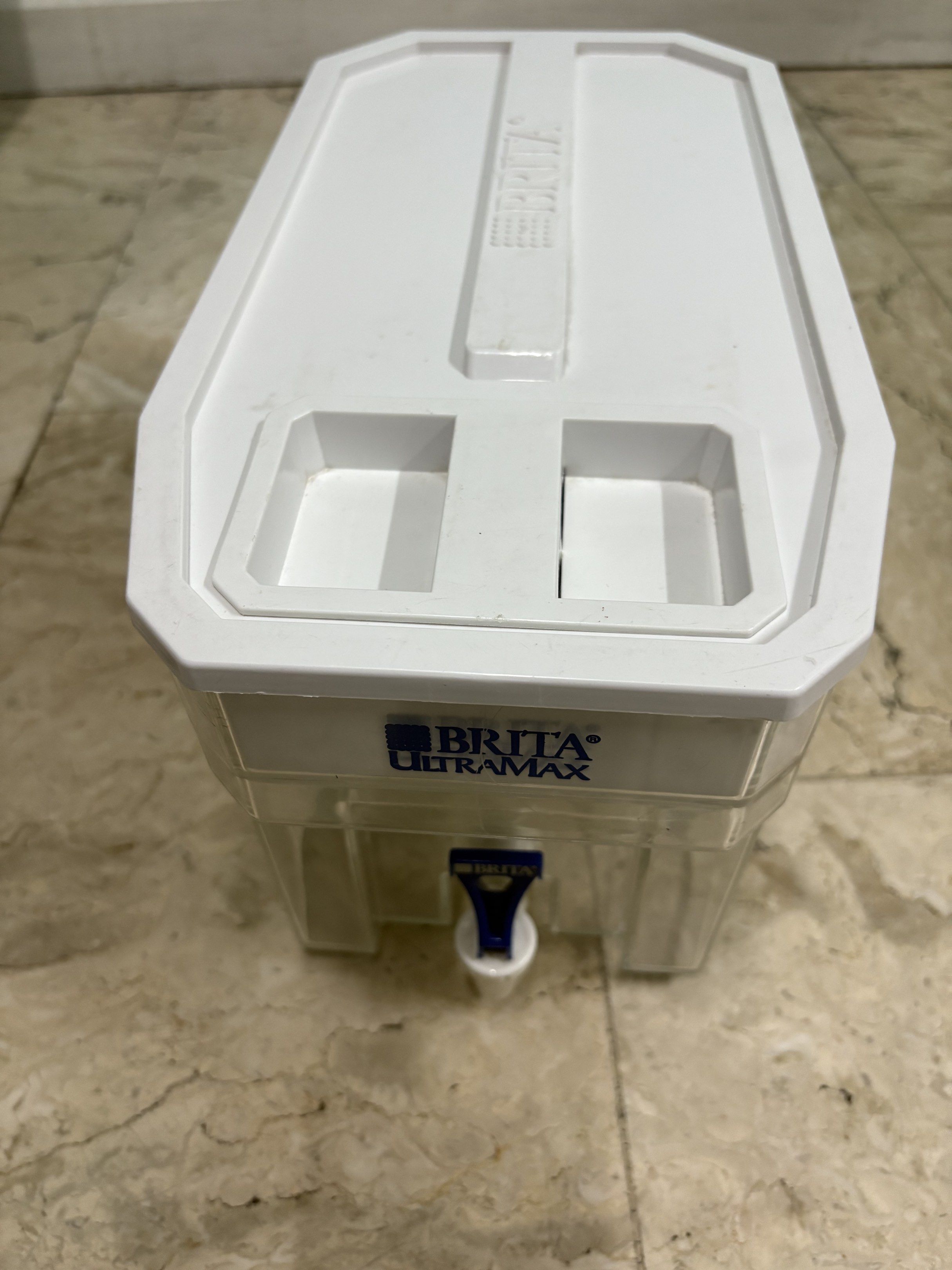 Brita Ultramax Water Filter Dispenser (Category: Pitchers & Dispensers) located in San Juan City. Submitted by lifeshop888 (Listing ID 1420204072, Image 1). Description: - Brita Ultramax water filter pitcher - Large capacity - Convenient spout for easy pouring - White and clear design - Perfect for filtering tap water.