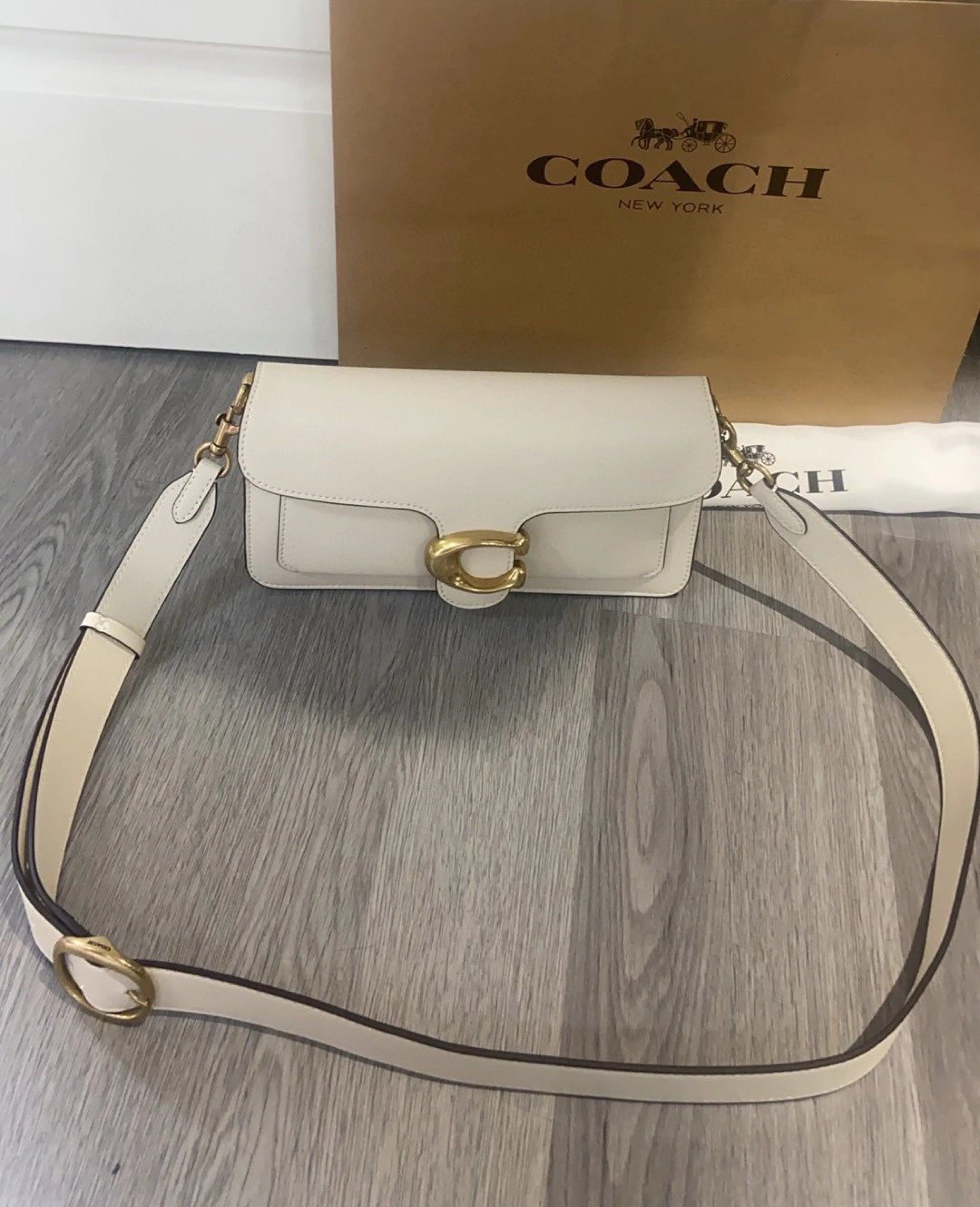 Coach Pillow Tabby Shoulder Bag (Category: Luxury Bags & Wallets) located in Manila. Submitted by randomreps (Listing ID 1420329348, Image 3). Description: - Coach Pillow Tabby shoulder bag - Sleek, rectangular design - Signature 'C' clasp - Detachable shoulder strap - Longer strap included - Comes with dust bag and Coach paper bag - Multiple interior compartments.