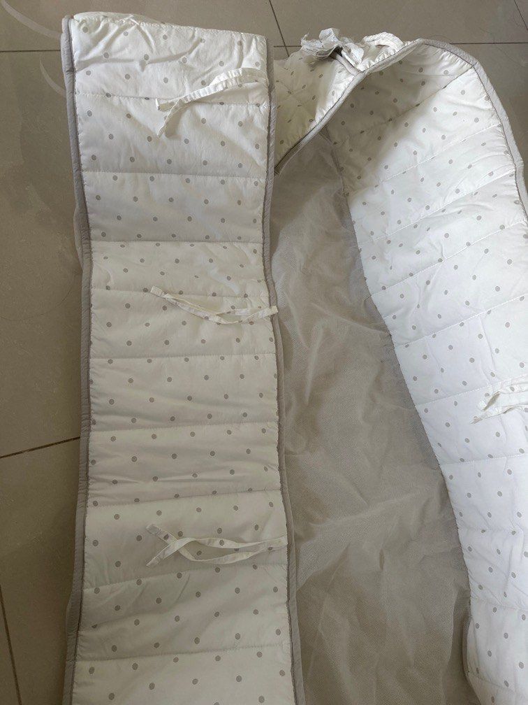 Cot bumper (Category: Bed Guards) located in Singapore. Submitted by --x3rain (Listing ID 1420177786, Image 2). Description: Thin cot bumper to prevent babies from sticking their arms or legs out of the cot. Heavily used with some stains.