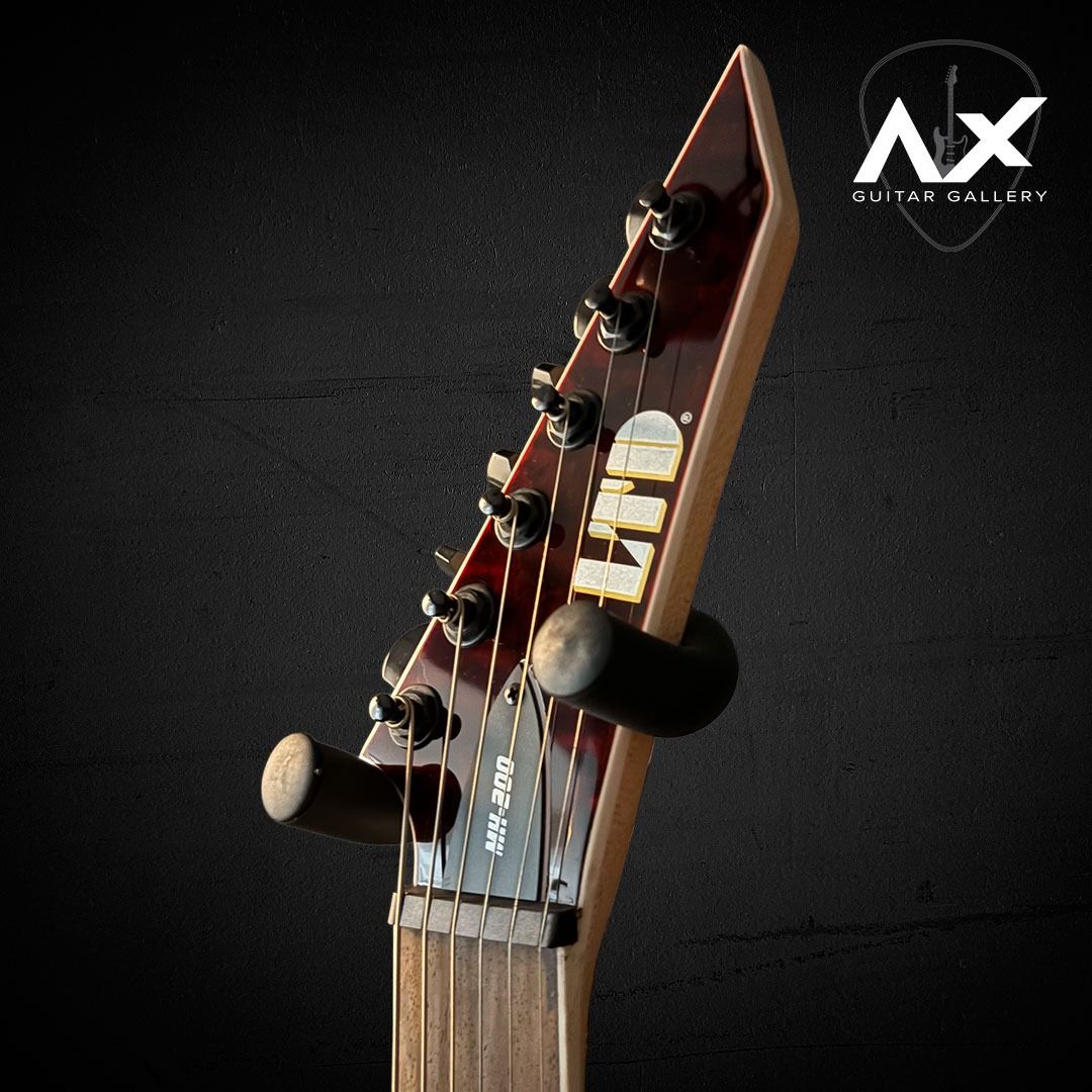 ESP LTD MH-200QM NT Electric Guitar (Category: Musical Instruments) located in Binmaley. Submitted by axguitargallery (Listing ID 1420227400, Image 2). Description: BRAND NEW ESP LTD MH-200QM NT The LTD MH-200QM NT blends the ESP Horizon’s arched top with the M Series edge—finished in a stunning See Thru Black Cherry quilted maple top. 🎸 Mahogany body + maple neck 🎸 24 extra-jumbo frets on rosewood fingerboard 🎸 ESP Designed pickups for punch 