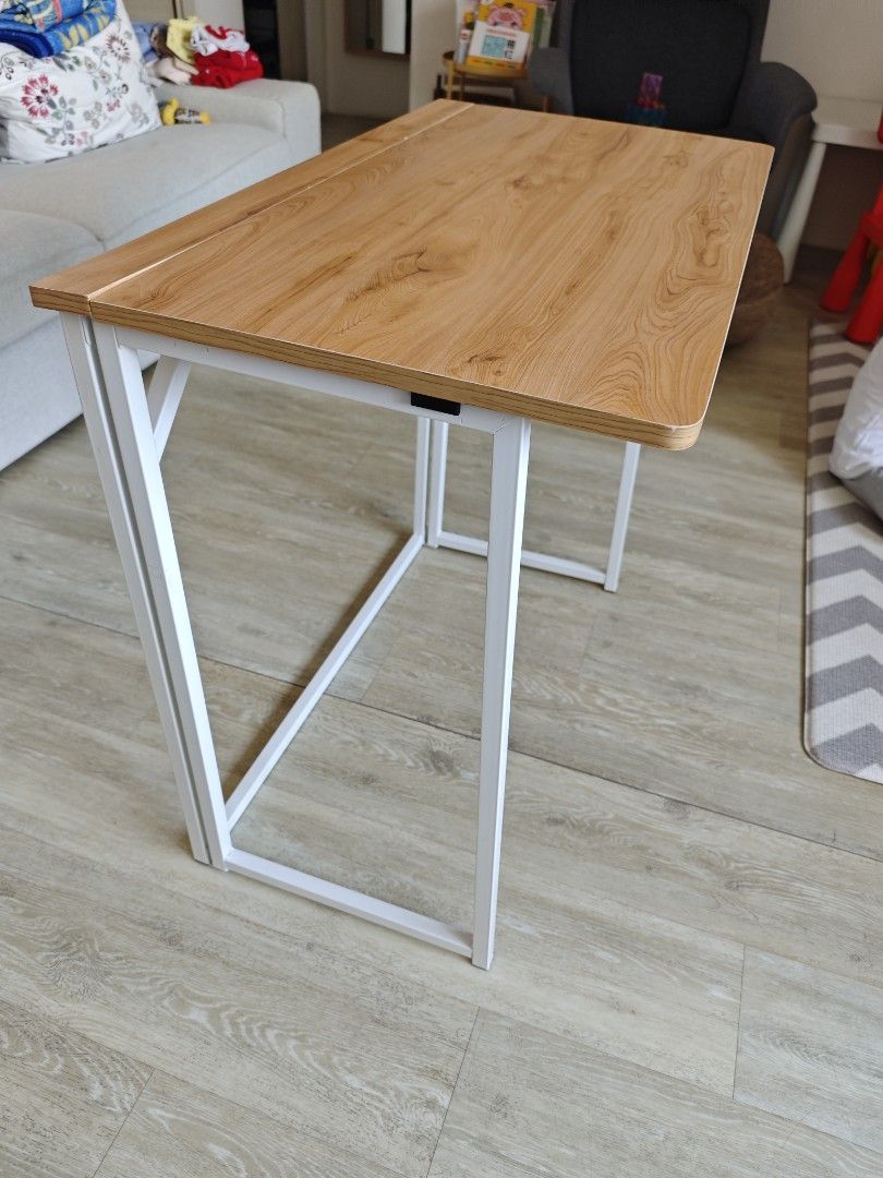 Foldable table (Category: Tables & Sets) located in Singapore. Submitted by iamchris07 (Listing ID 1420163781, Image 1). Description: measures 80cm wide, 45cm x 75cm height when set up. RSP SGD 70..