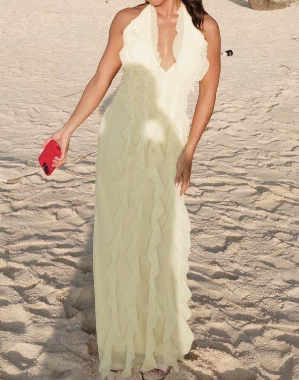 Halter Neck Ruffle Maxi Dress (Category: Dresses) located in Quezon City. Submitted by cocoisla (Listing ID 1420179037, Image 2). Description: - Elegant maxi dress - Floor-length height for reference is 4’9 with 4-5 inches heels -XS-S Used once only for a wedding .