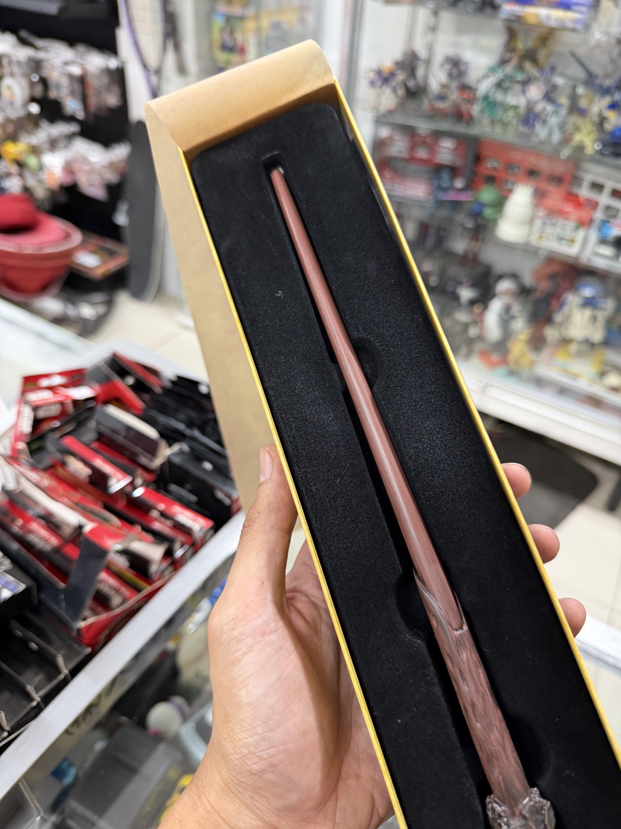 Harry Potter Wand with Box (Category: Western Merchandise) located in Makati City. Submitted by japankycollection (Listing ID 1420184473, Image 2). Description: - Authentic Harry Potter wand - Includes original box - Detailed wand design - Protective case included - Features Harry Potter branding - Perfect for collectors.