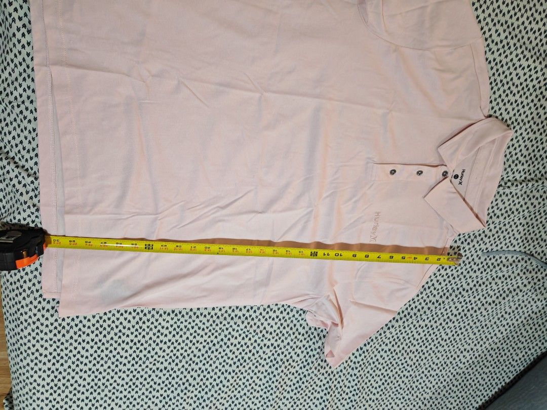 Hurley Polo Shirt - XL (Category: Tshirts & Polo Shirts ) located in Caloocan City. Submitted by thanntrums (Listing ID 1420159183, Image 2). Description: - Pink Hurley polo shirt - Size: XL - Features a three-button placket - Hurley logo on the chest - Made in India.