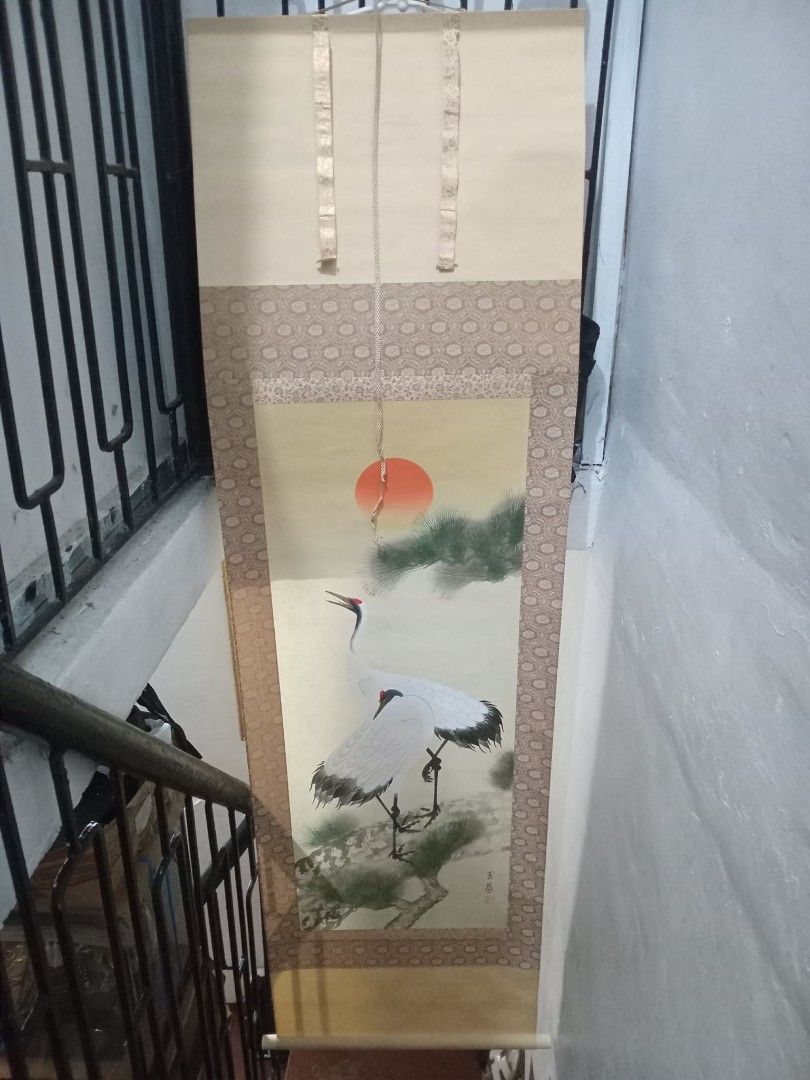 Japanese Crane Scroll Painting (Category: Wall Decor) located in Taguig. Submitted by ashicollection (Listing ID 1420347164, Image 1). Description: - Japanese scroll painting - Features two cranes and a red sun - Elegant cream-colored background - Decorative border - Includes ribbons for hanging.