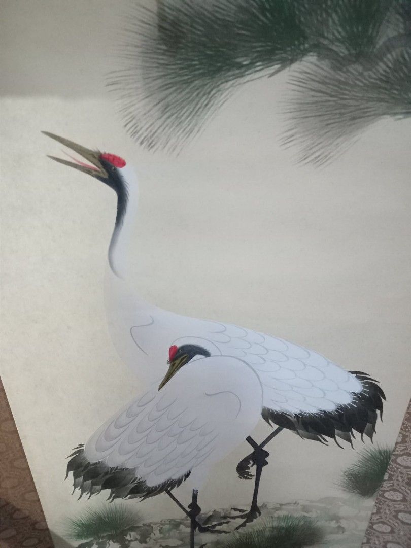 Japanese Crane Scroll Painting (Category: Wall Decor) located in Taguig. Submitted by ashicollection (Listing ID 1420347164, Image 3). Description: - Japanese scroll painting - Features two cranes and a red sun - Elegant cream-colored background - Decorative border - Includes ribbons for hanging.