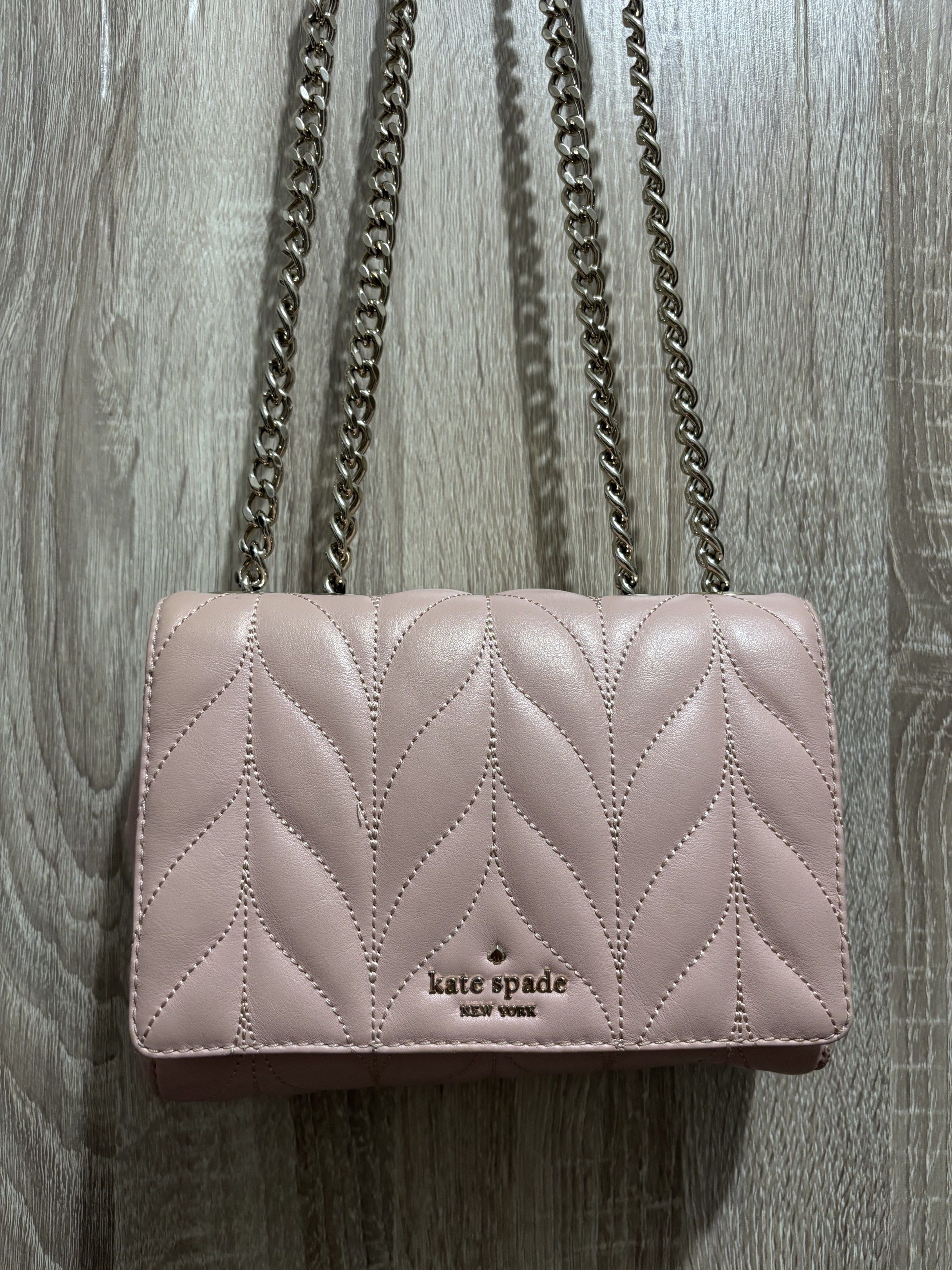 Kate Spade Pink Quilted Shoulder Bag (Category: Luxury Bags & Wallets) located in Cavite. Submitted by thewatchph (Listing ID 1420311186, Image 2). Description: KATE SPADE - Authentic Kate Spade shoulder bag - Chic quilted design - Elegant chain strap - Pretty pink color - Secure flap closure - Interior small pocket - Iconic Kate Spade logo - Includes care card -in good condition (used but not abused) RFS: declutering.