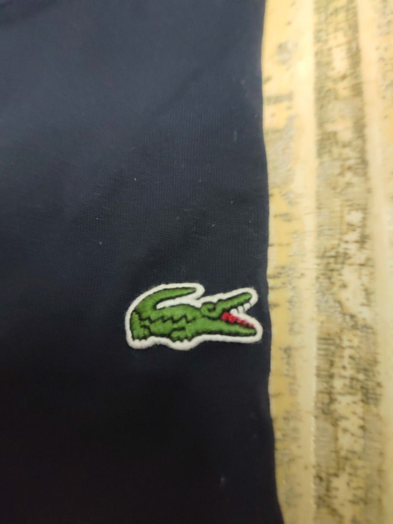 Lacoste Regular Fit T-shirt - Navy Blue (Category: Tshirts & Polo Shirts ) located in Manila. Submitted by icarus53891 (Listing ID 1420347826, Image 3). Description: - Lacoste T-shirt - Regular fit - Navy blue body with white panel - Lacoste logo on chest - Size: FR 3 / US S.
