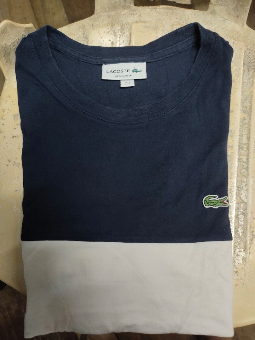 Lacoste Regular Fit T-shirt - Navy Blue (Category: Tshirts & Polo Shirts ) located in Manila. Submitted by icarus53891 (Listing ID 1420347826, Image 2). Description: - Lacoste T-shirt - Regular fit - Navy blue body with white panel - Lacoste logo on chest - Size: FR 3 / US S.