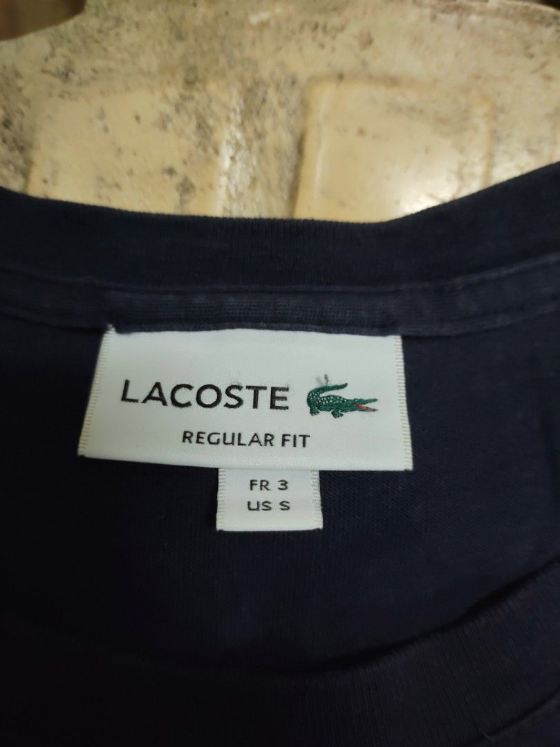 Lacoste Regular Fit T-shirt - Navy Blue (Category: Tshirts & Polo Shirts ) located in Manila. Submitted by icarus53891 (Listing ID 1420347826, Image 1). Description: - Lacoste T-shirt - Regular fit - Navy blue body with white panel - Lacoste logo on chest - Size: FR 3 / US S.