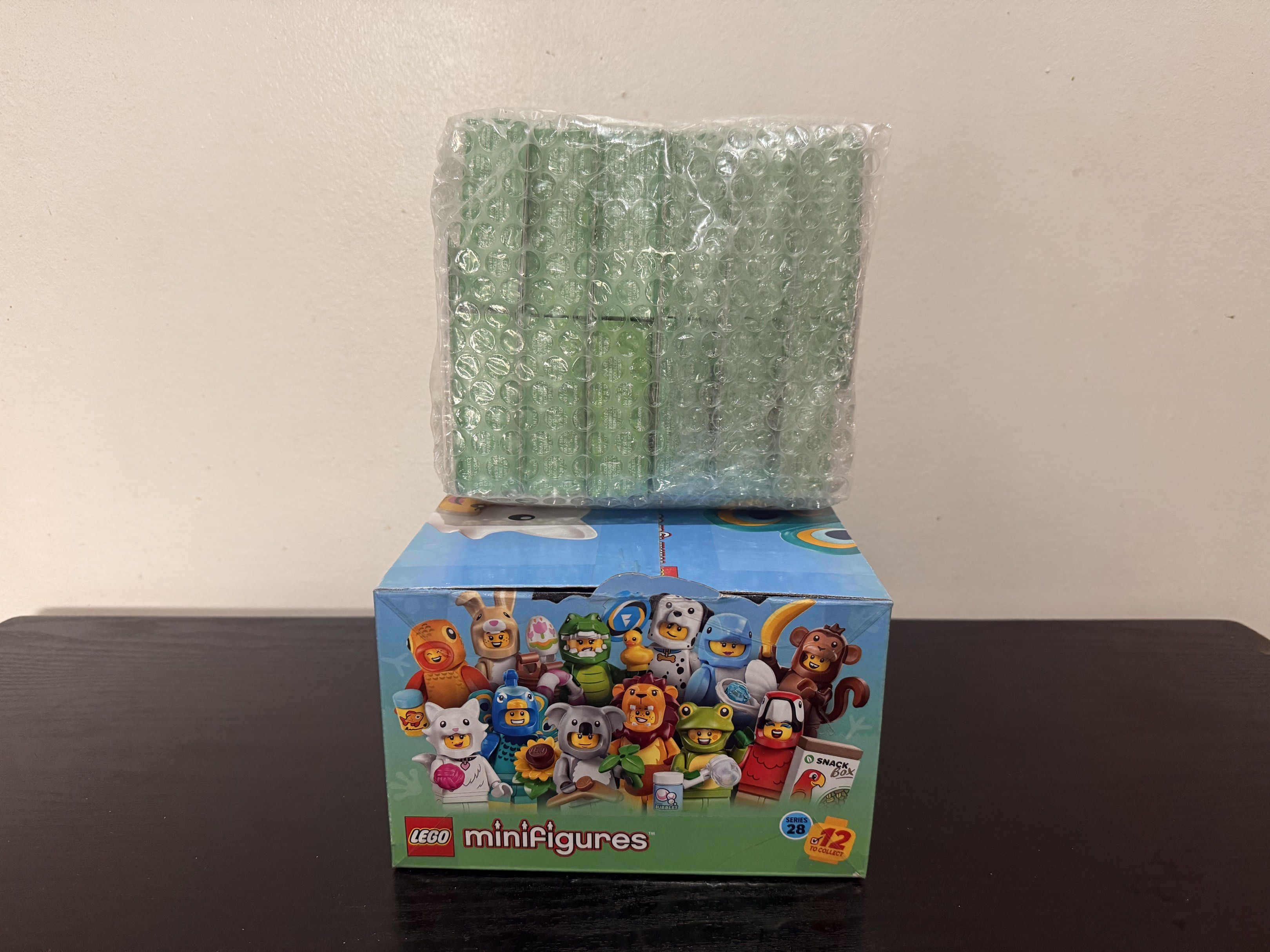 Lego Minifigures Series 28 Complete 12 (Category: Lego & Building Sets) located in Quezon City. Submitted by wertymoshi (Listing ID 1420189603, Image 2). Description: - Lego Minifigures Series 28 - Includes 12 unopened packs - Great for collectors and Lego fans - Each pack contains a surprise minifigure and accessories.