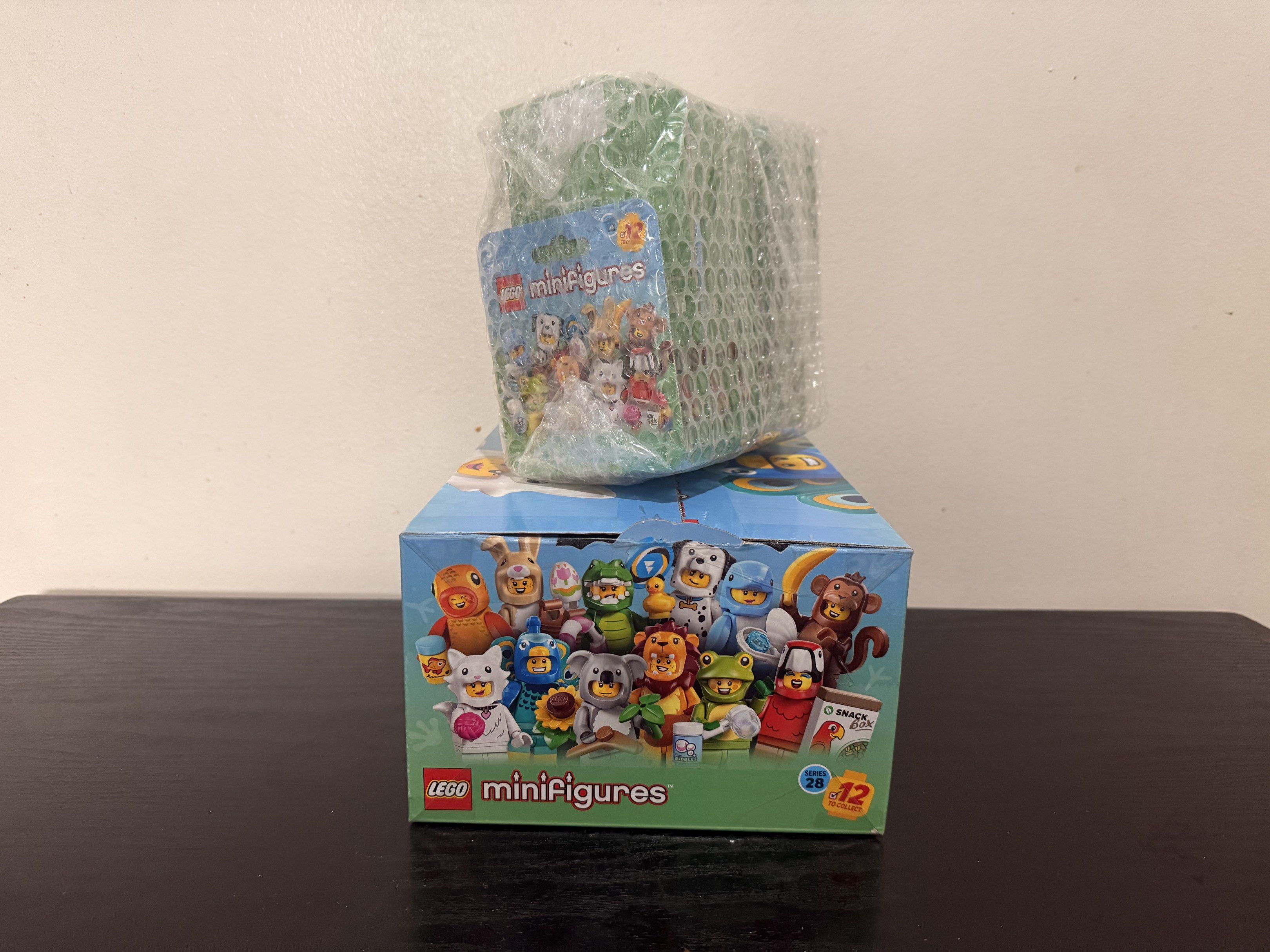 Lego Minifigures Series 28 Complete 12 (Category: Lego & Building Sets) located in Quezon City. Submitted by wertymoshi (Listing ID 1420189603, Image 1). Description: - Lego Minifigures Series 28 - Includes 12 unopened packs - Great for collectors and Lego fans - Each pack contains a surprise minifigure and accessories.