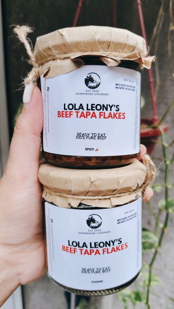 Lola Leony's Beef Tapa Flakes (Category: Other Food & Drinks) located in Quezon City. Submitted by momsgreatfinds (Listing ID 1420239367, Image 1). Description: Available na po! 😍 LOLA LEONY’S BEEF TAPA FLAKES ✨ ₱250 only | 330g (good for sharing) 🍳 Best paired with sinangag at itlog 🍚 Perfect din as topping sa mainit na kanin 🔥 Ready-to-eat, swak sa busy days! Classic or Spicy — alin ang pipiliin mo? 😋 PM na para umorder 💌 Ty. 👵 📌Lola Le