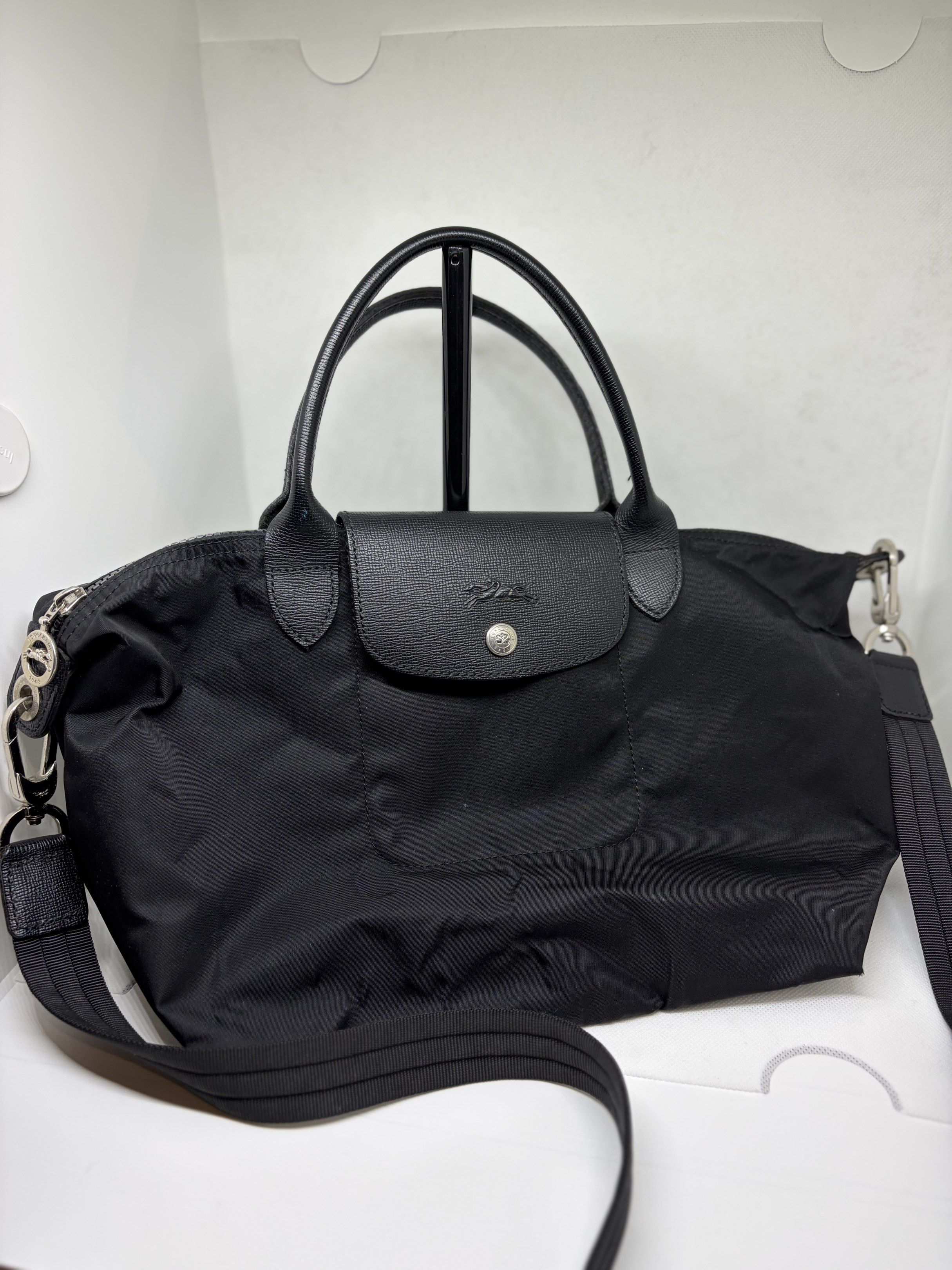 Longchamp Le Pliage Néo Small (Category: Luxury Bags & Wallets) located in Quezon City. Submitted by offload.rpl (Listing ID 1420296957, Image 1). Description: Longchamp Le Pliage Néo Small Color: Black Dimensions (LxHxW): 25x23x16cm Condition: Used Price: Php 2,500.00.