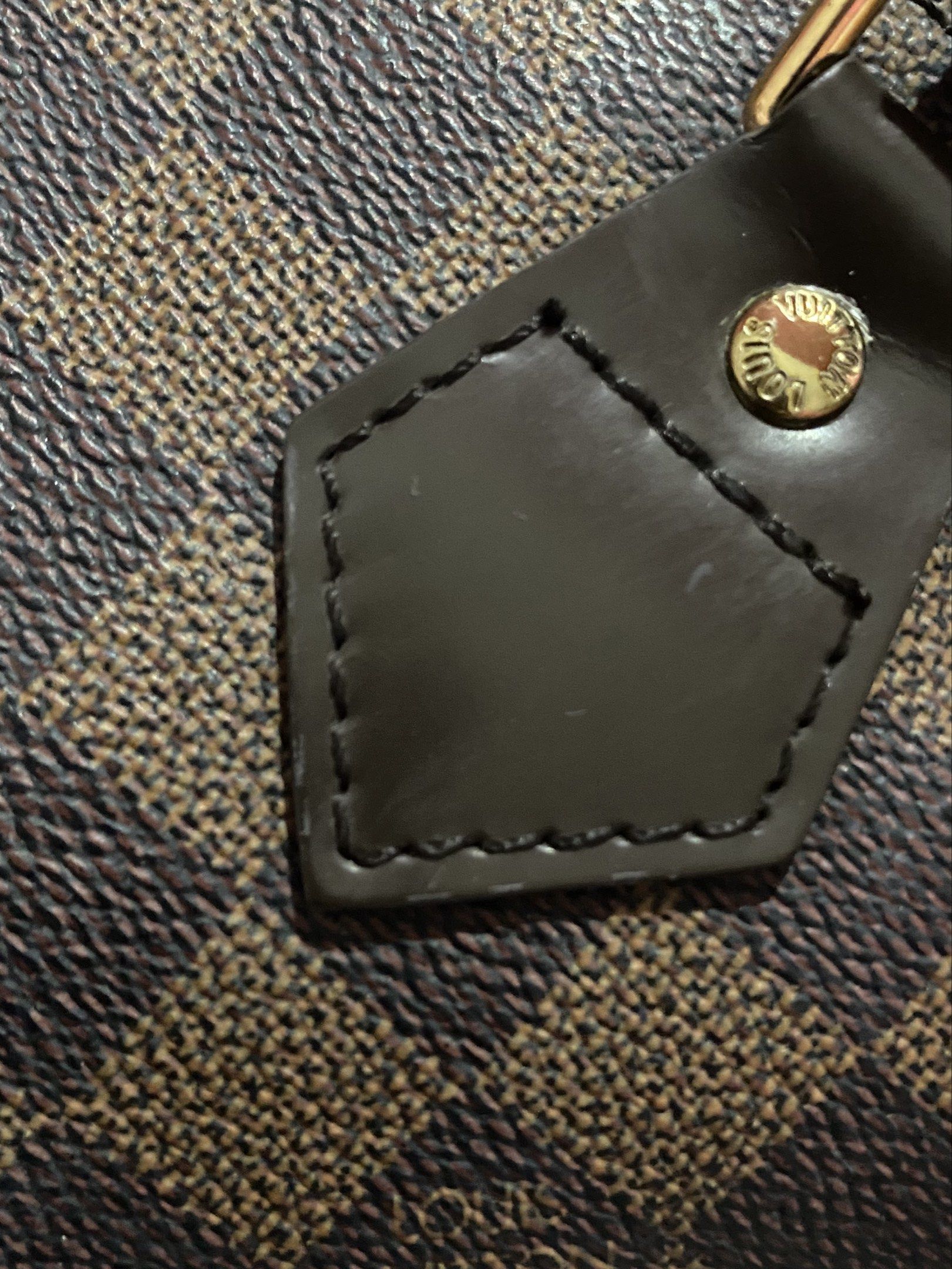 Louis Vuitton Damier Ebene Speedy 30 (Category: Luxury Bags & Wallets) located in Manila. Submitted by br0kebaddieng (Listing ID 1420190673, Image 3). Description: - Authentic Louis Vuitton Speedy 30 - Damier Ebene canvas - Classic checkered pattern - Dual rolled handles - Top zip closure - Detachable shoulder strap - Gold-tone hardware - Spacious interior - Ideal for everyday use - Price is negotiable .
