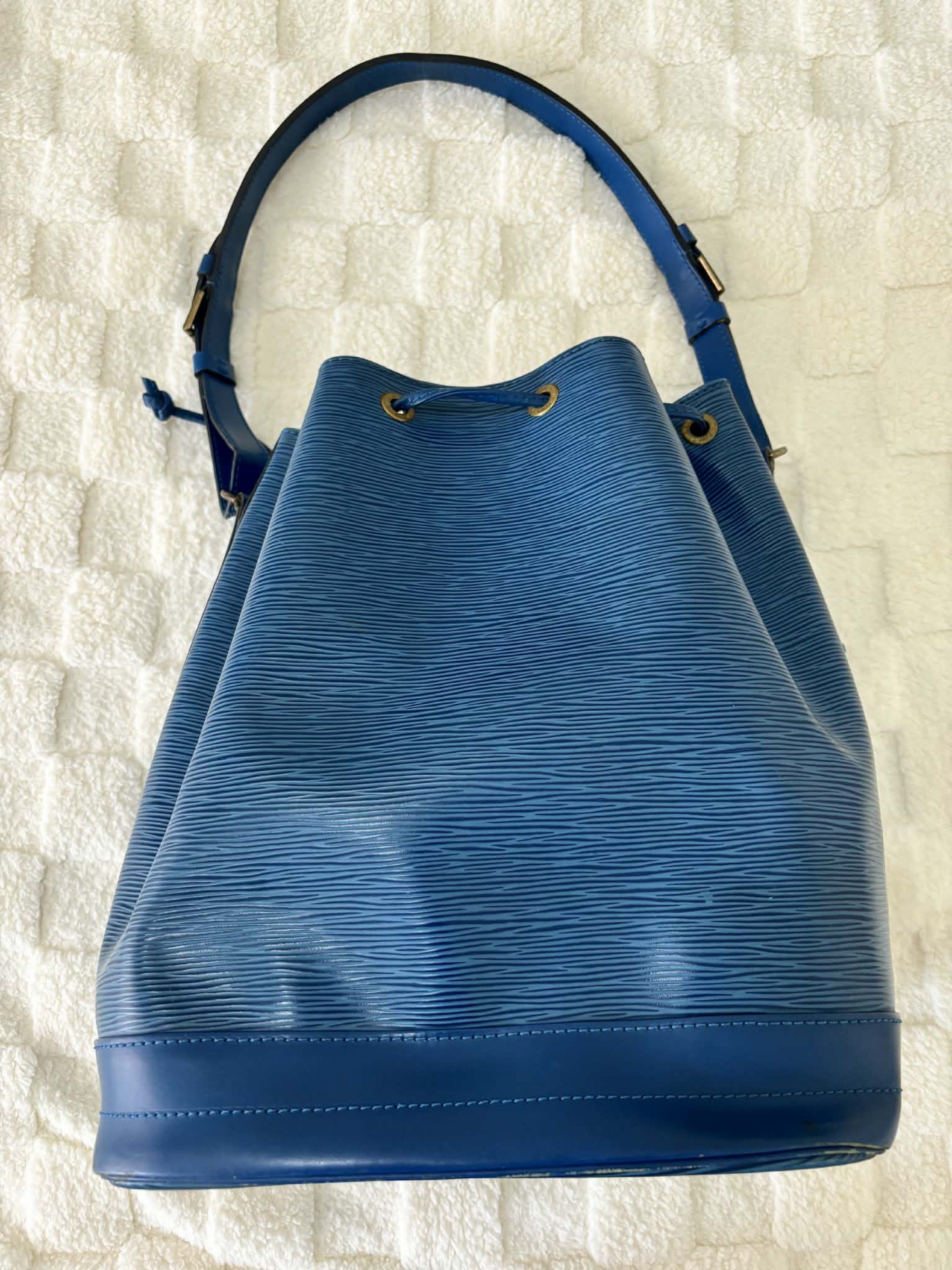 Louis Vuitton Epi Leather Bucket Bag (Category: Luxury Bags & Wallets) located in Makati City. Submitted by selle_personal_decluttering (Listing ID 1420272592, Image 2). Description: Louis Vuitton Epi Noé Bucket Bag – Blue (Authentic, Preloved) Selling my authentic Louis Vuitton Noé in blue Epi leather. A classic, timeless bucket bag with an adjustable shoulder strap. Price: ₱19,000 Details: • Model: Louis Vuitton Noé • Material: Epi leather • Co