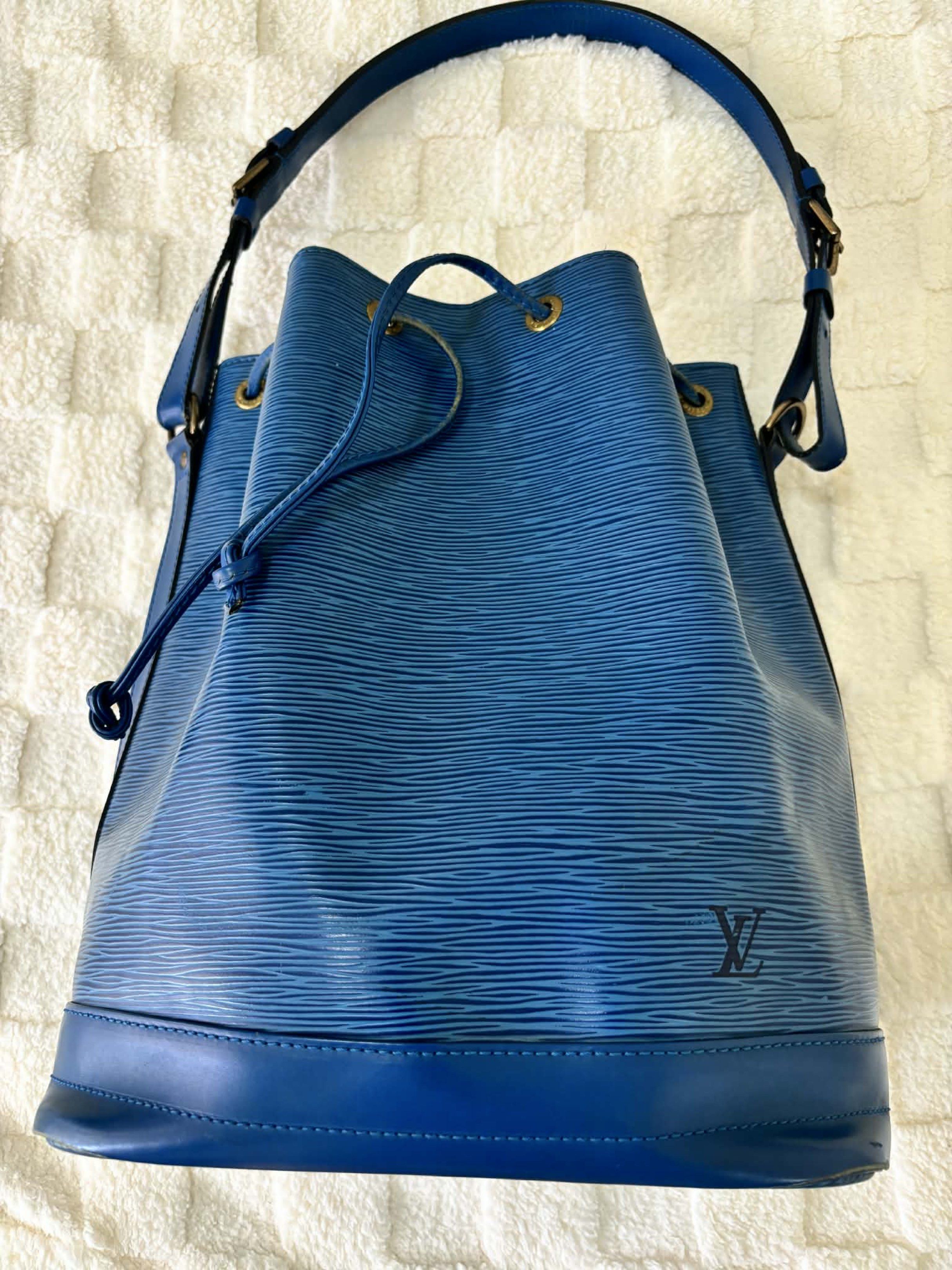Louis Vuitton Epi Leather Bucket Bag (Category: Luxury Bags & Wallets) located in Makati City. Submitted by selle_personal_decluttering (Listing ID 1420272592, Image 1). Description: Louis Vuitton Epi Noé Bucket Bag – Blue (Authentic, Preloved) Selling my authentic Louis Vuitton Noé in blue Epi leather. A classic, timeless bucket bag with an adjustable shoulder strap. Price: ₱19,000 Details: • Model: Louis Vuitton Noé • Material: Epi leather • Co