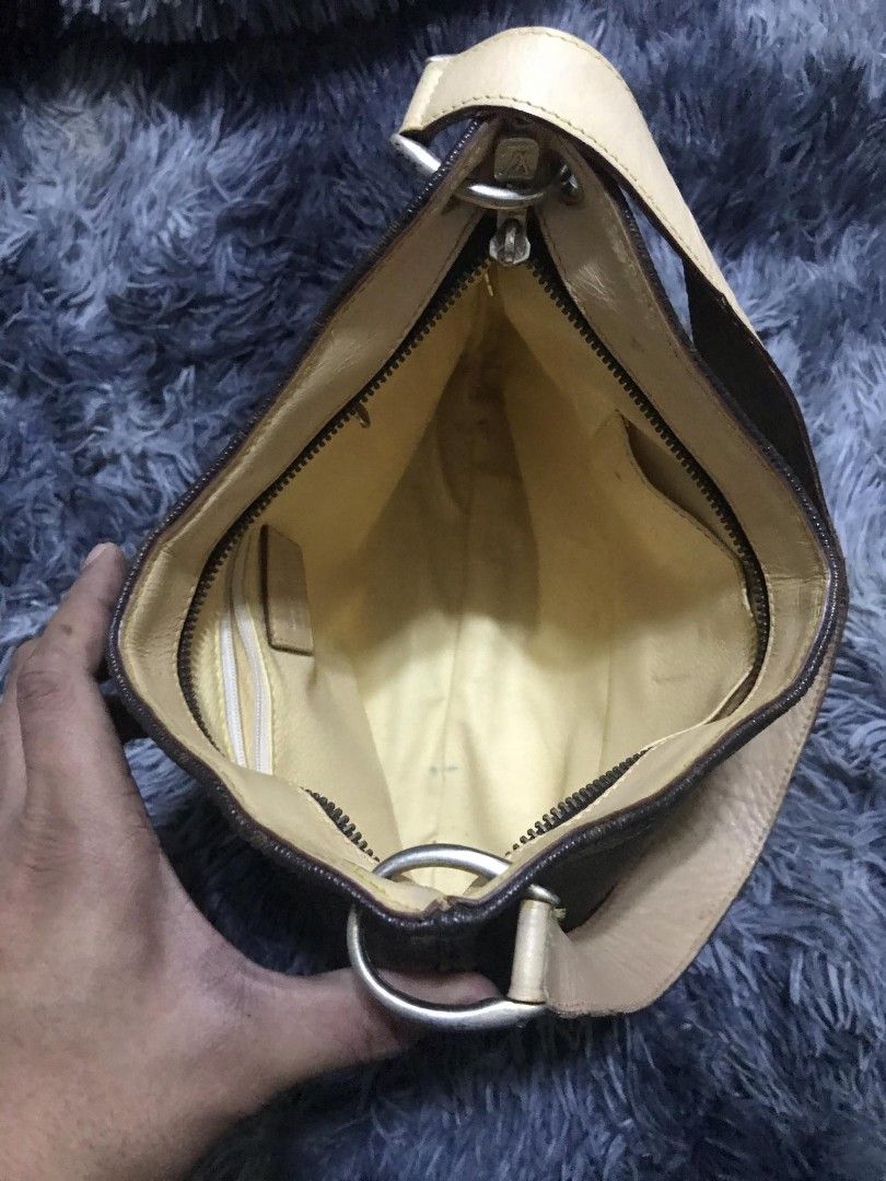 Louis Vuitton Monogram Shoulder Bag (Category: Luxury Bags & Wallets) located in Paranaque City. Submitted by jayson193 (Listing ID 1420297012, Image 3). Description: - Authentic Louis Vuitton shoulder bag - Classic Monogram canvas - Brown leather strap - Secure zip closure - Yellow fabric lining - Spacious interior - Made in France - Perfect for everyday use.