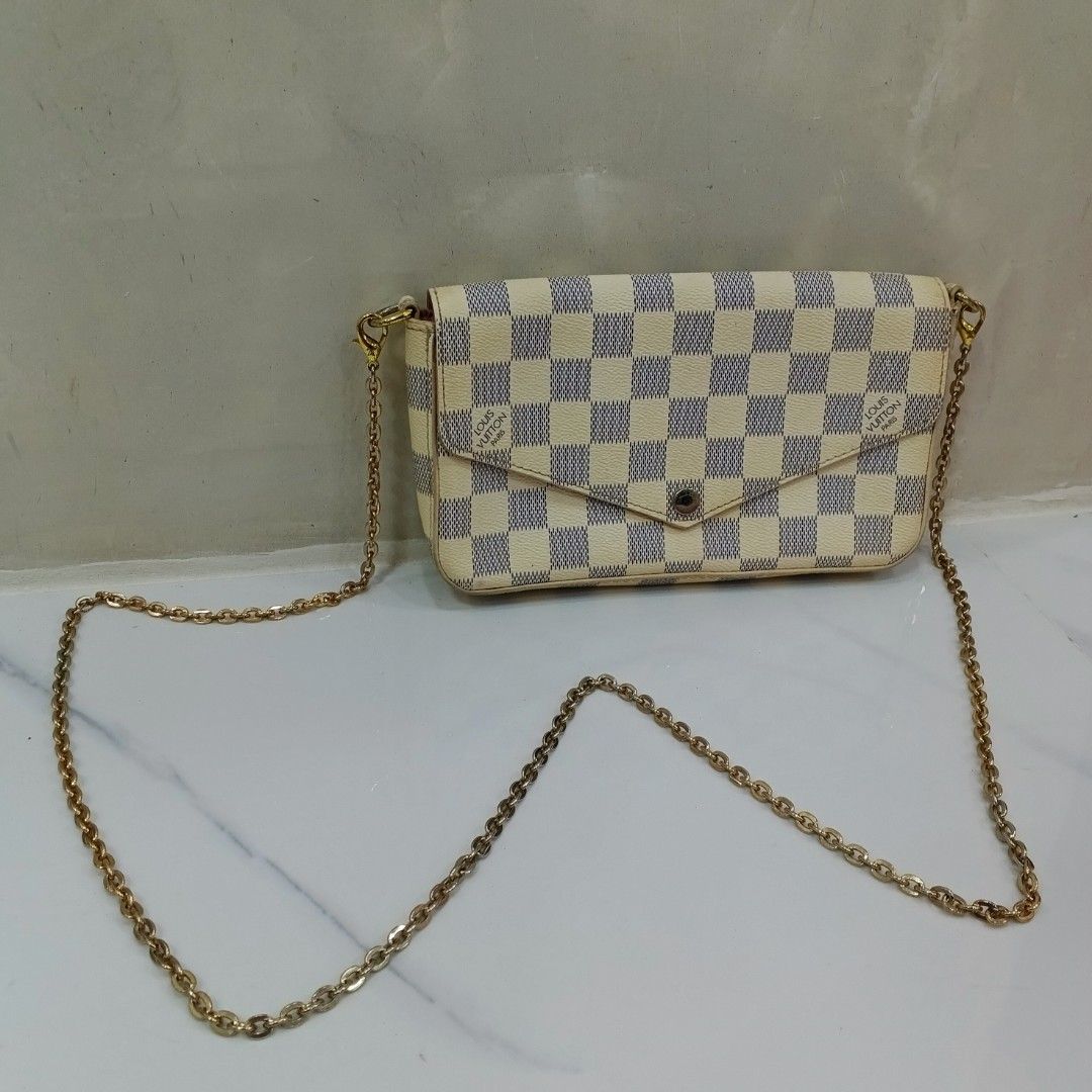 Louis Vuitton Pochette Felicie Damier Ebene (Category: Luxury Bags & Wallets) located in Malasiqui. Submitted by drie_findss (Listing ID 1420184834, Image 1). Description: LOUIS VUITTON Damier Azur Pochette Felicie crossbody bag (Authentic) ‎______________________ ‎Size: S ‎(Measured by INCHES) ‎Width: 8.5 ‎Length: 5 ‎Condition: EXCELLENT ‎Color Rate: 10/10 ‎Issue: none ‎ ‎"Colors may vary due to lightning" ‎"Swipe to see more details of piece an