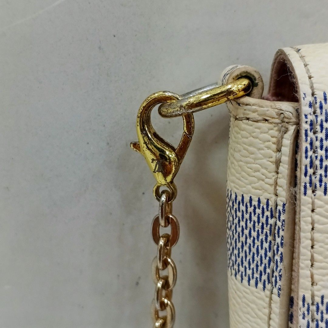 Louis Vuitton Pochette Felicie Damier Ebene (Category: Luxury Bags & Wallets) located in Malasiqui. Submitted by drie_findss (Listing ID 1420184834, Image 3). Description: LOUIS VUITTON Damier Azur Pochette Felicie crossbody bag (Authentic) ‎______________________ ‎Size: S ‎(Measured by INCHES) ‎Width: 8.5 ‎Length: 5 ‎Condition: EXCELLENT ‎Color Rate: 10/10 ‎Issue: none ‎ ‎"Colors may vary due to lightning" ‎"Swipe to see more details of piece an