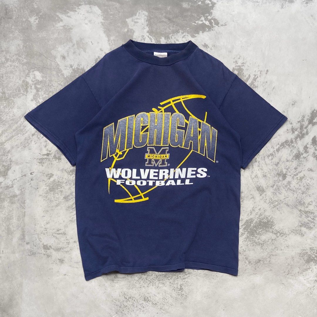 Michigan Wolverines Football (Category: Tshirts & Polo Shirts ) located in Muntinlupa City. Submitted by everydayfriiday (Listing ID 1420289615, Image 1). Description: Michigan Wolverines Football Medium 20x27 Issue: repaired pinhole 350 + sf.