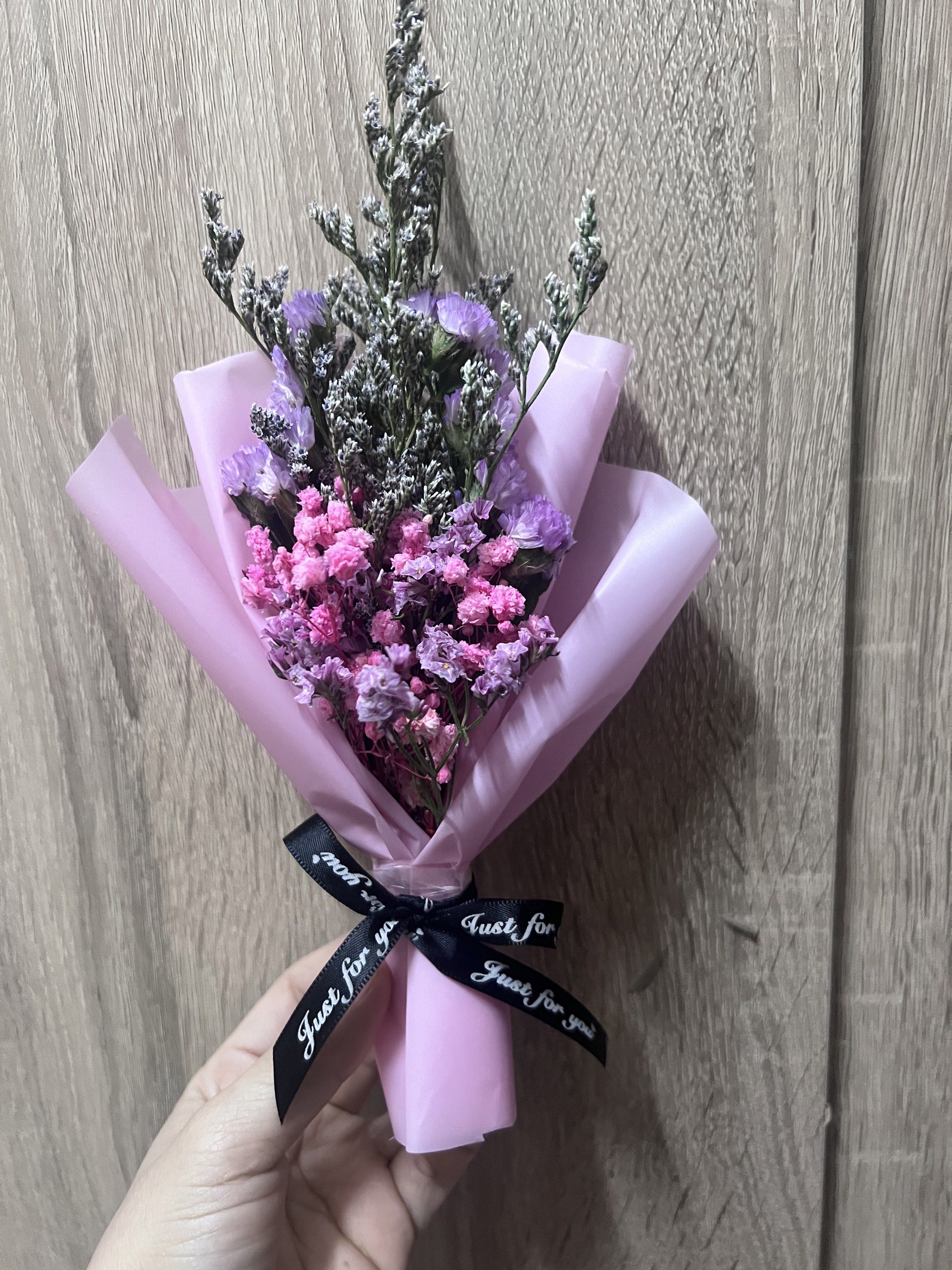 Mini bouquet with mondefa chocolate (Category: Flowers & Bouquets) located in Mandaluyong City. Submitted by samarahmay (Listing ID 1420259792, Image 2). Description: - Heart-shaped Mondefa chocolate box - Includes a small bouquet of dried flowers - Bouquet wrapped in pink paper - Tied with a black ribbon that says "Just for you" - Perfect for gifting or decoration - Ready to give -lasting up to 2 years.