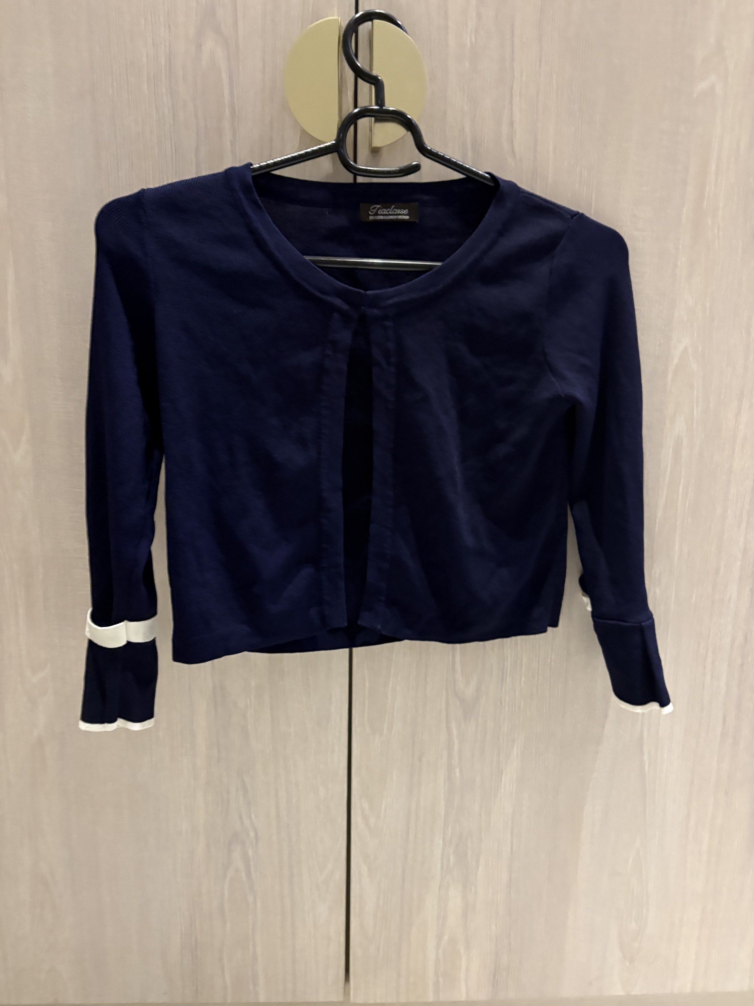 Navy Blue Cardigan with White Trim (Category: Coats, Jackets and Outerwear) located in Manila. Submitted by gabbieeigenmann (Listing ID 1420231046, Image 1). Description: Never been worn.