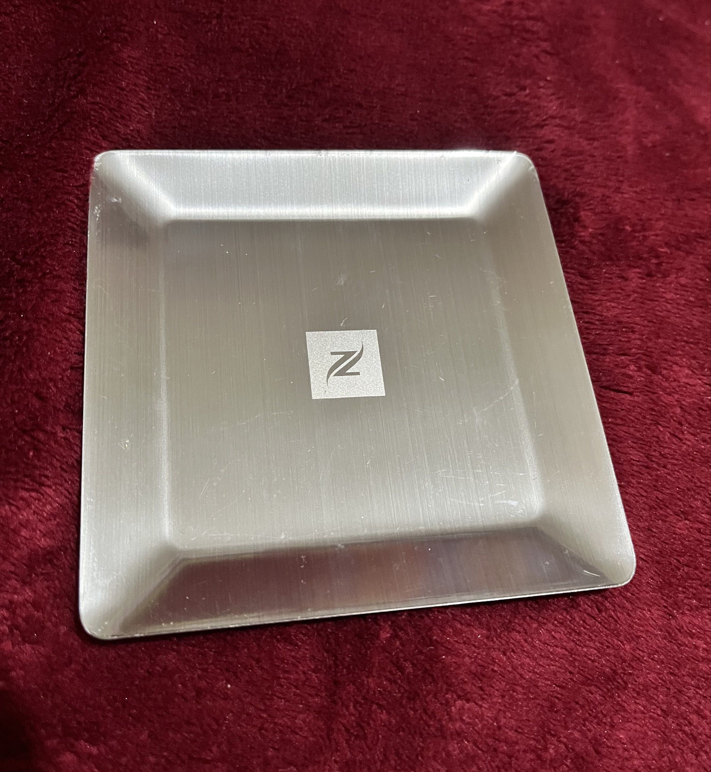 Nespresso Metal Coasters/ Small Serving Dish 2 pcs (Category: Coffee & Tea Tableware) located in La Trinidad. Submitted by whatnotcollections (Listing ID 1420285553, Image 3). Description: - Set of two Nespresso stainless steel coasters. - Features a brushed steel finish. - Showcases the Nespresso logo. - Adds a touch of elegance to your coffee setup. - Protects surfaces from spills and heat. - approximately 4” x 4” Slightly negotiable for sure b